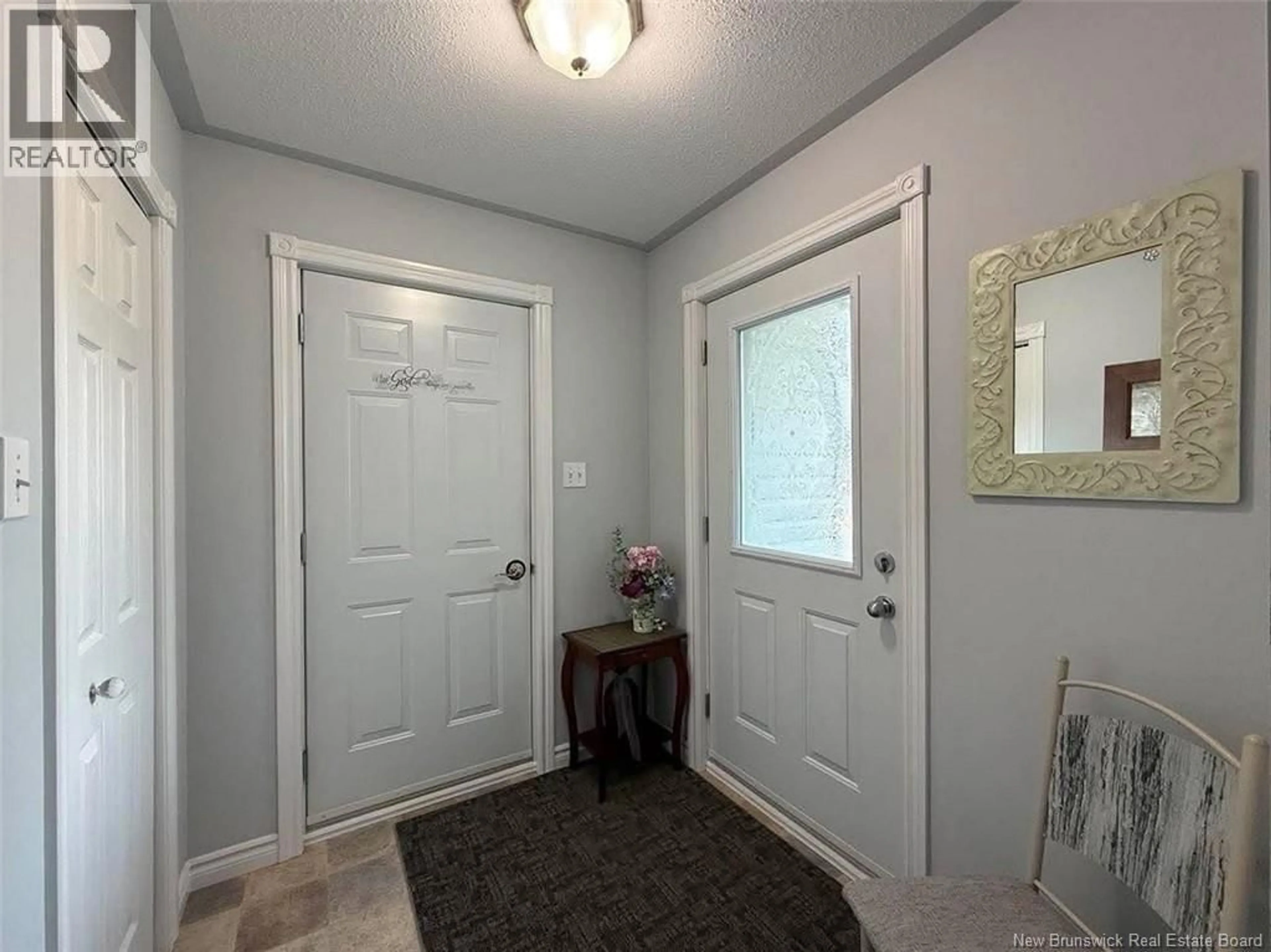 Indoor entryway for 55 DE LA CAPITALE BOULEVARD, Edmundston New Brunswick E3V5A3