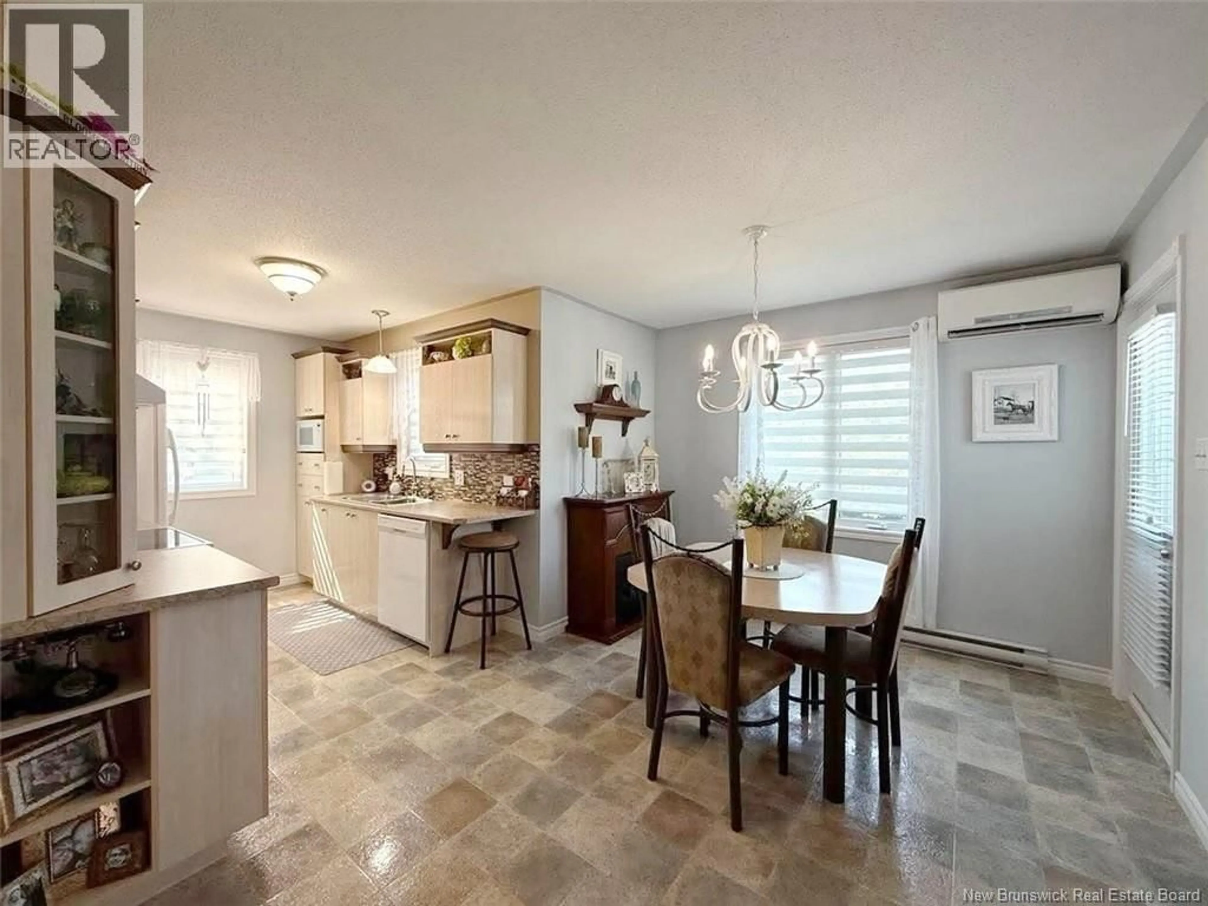 Open concept kitchen, ceramic/tile floor for 55 DE LA CAPITALE BOULEVARD, Edmundston New Brunswick E3V5A3