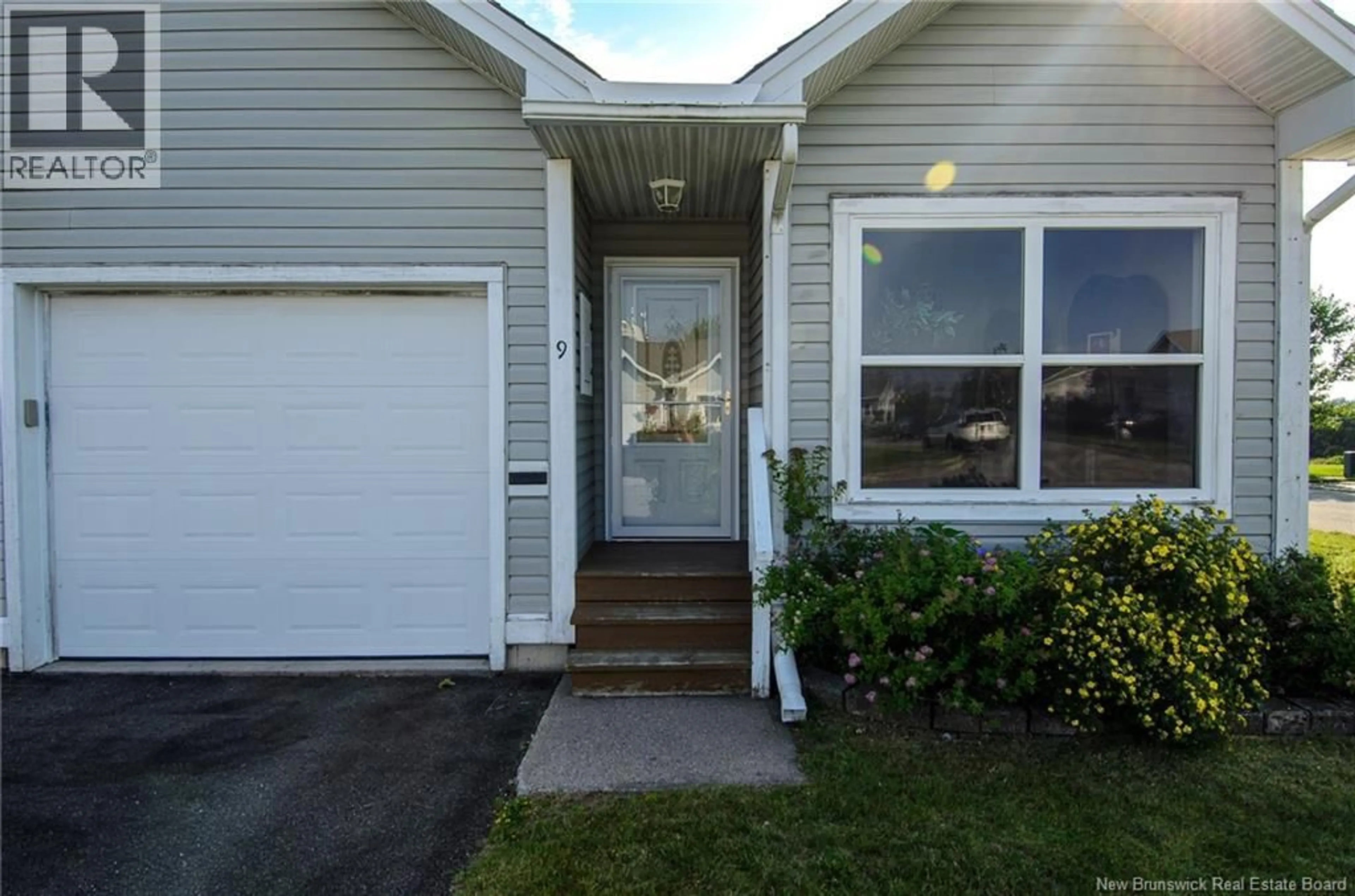 Home with vinyl exterior material, street for 9 SAINT PETERS COURT, Saint John New Brunswick E2K5N4