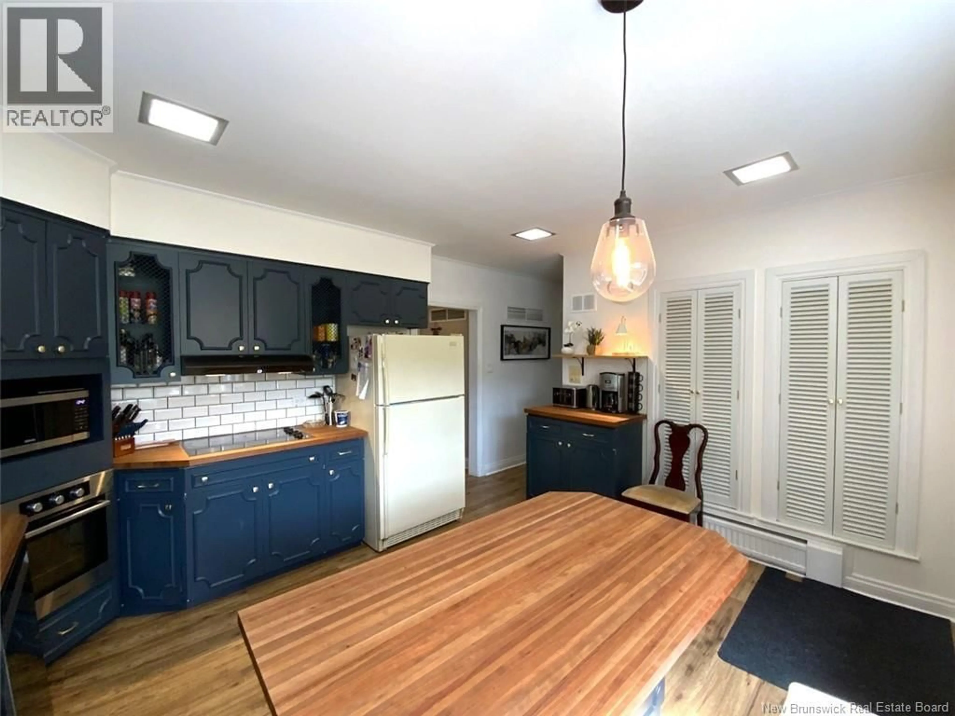 Open concept kitchen, unknown for 28 LAWSON STREET, Edmundston New Brunswick E3V1Z4