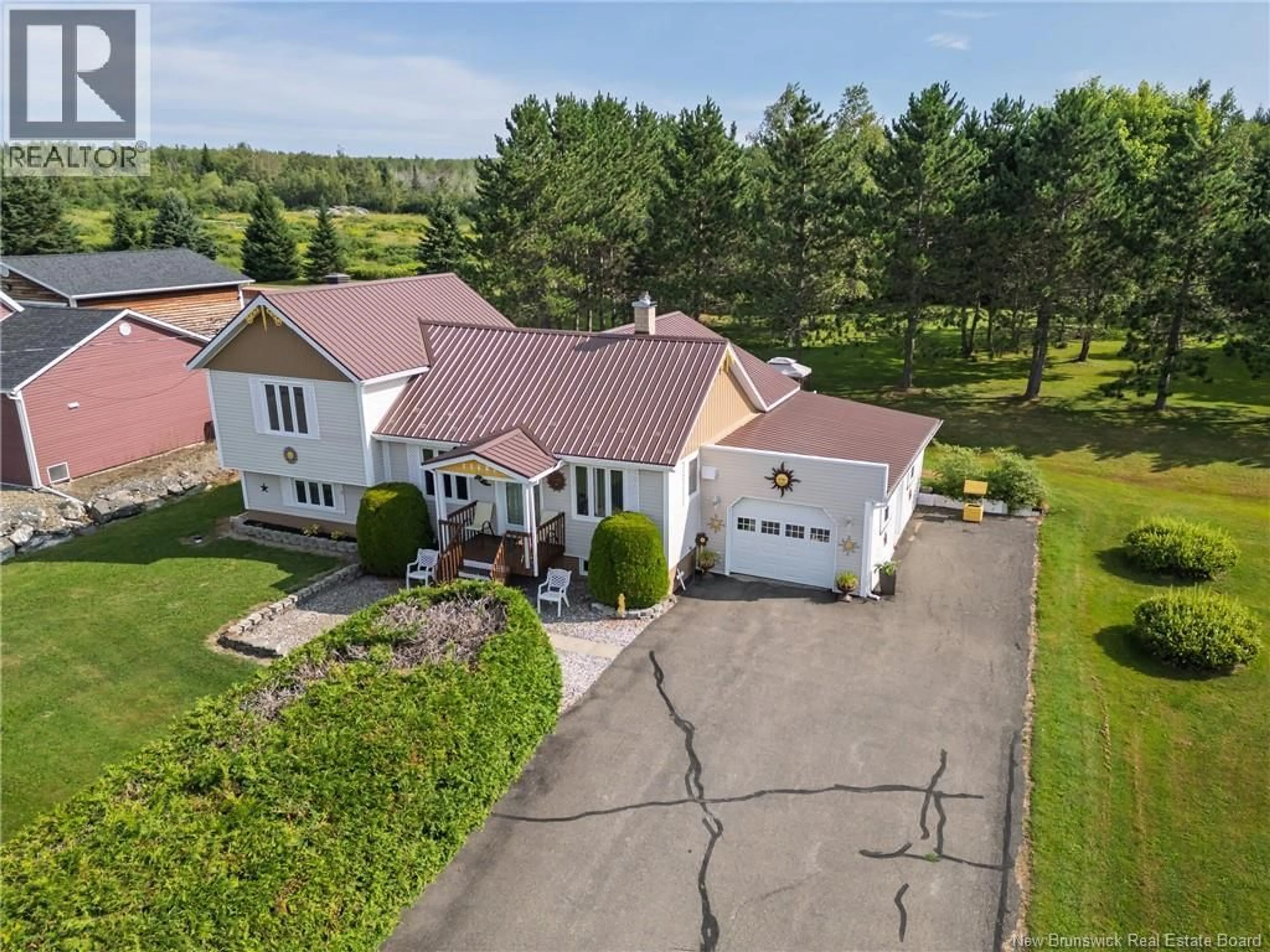 A pic from outside/outdoor area/front of a property/back of a property/a pic from drone, street for 11487 ROUTE 144, Saint-Léonard-Parent New Brunswick E7E2N2
