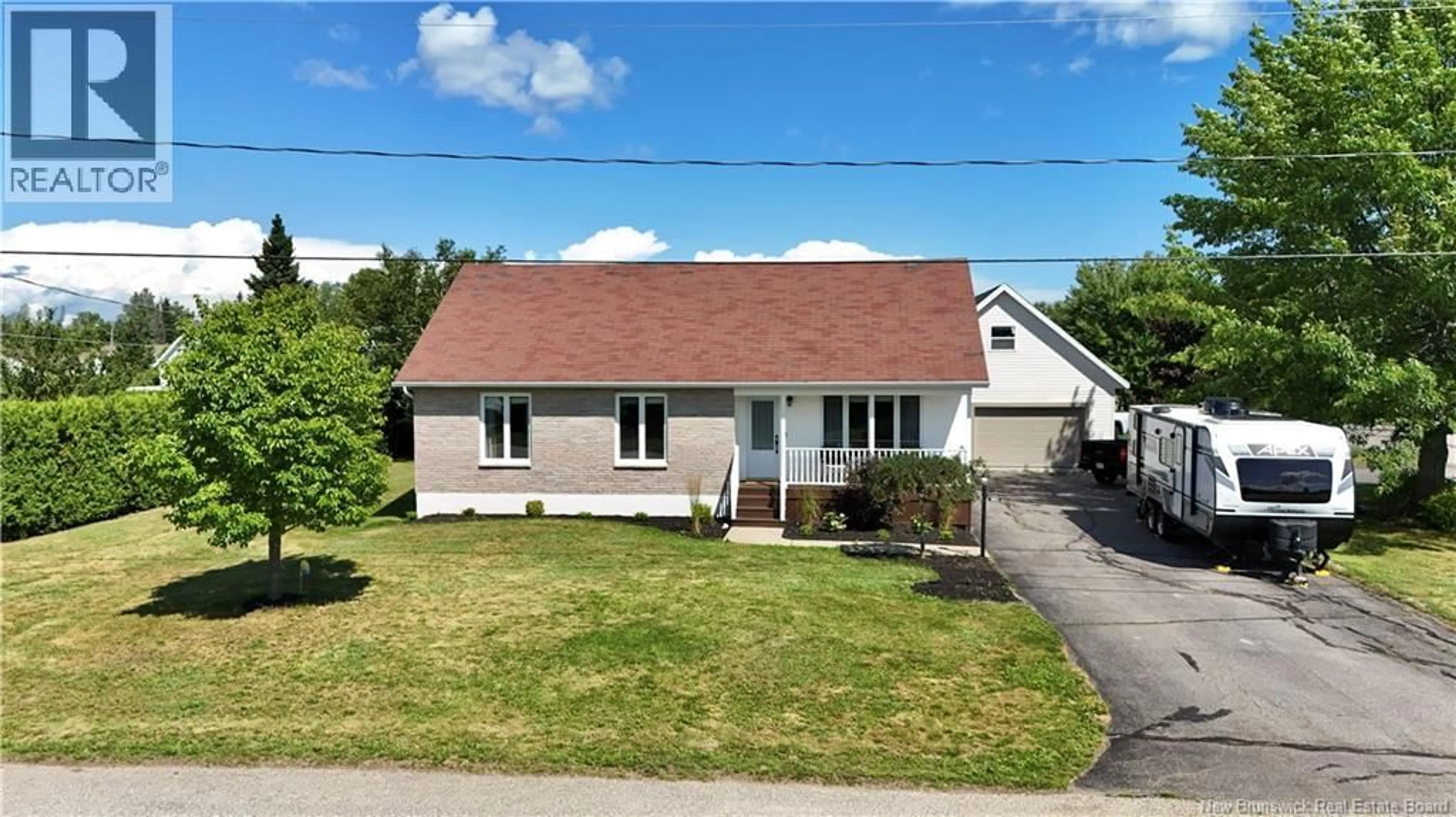 A pic from outside/outdoor area/front of a property/back of a property/a pic from drone, street for 1031 HACHE, Beresford New Brunswick E8K1H9