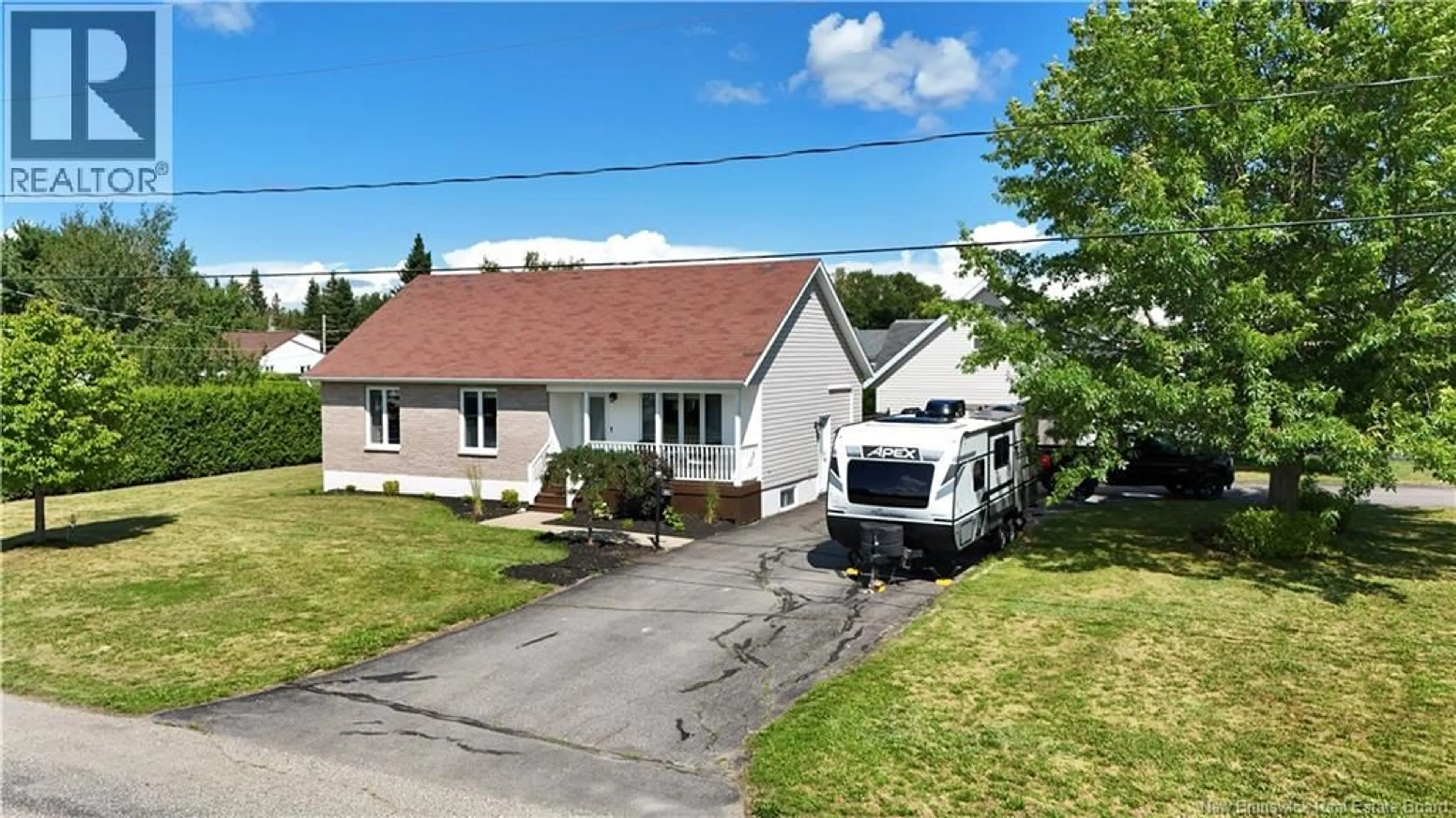 A pic from outside/outdoor area/front of a property/back of a property/a pic from drone, street for 1031 HACHE, Beresford New Brunswick E8K1H9