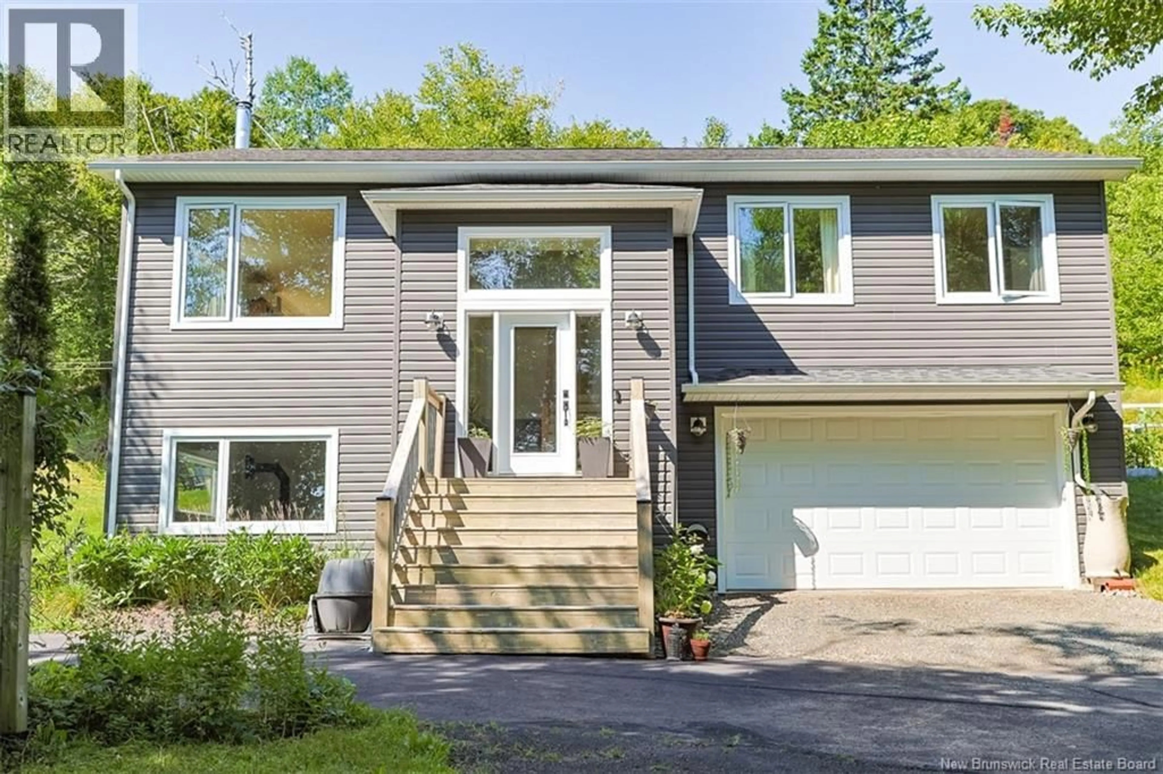 Home with vinyl exterior material, street for 4 EPWORTH PARK ROAD, Grand Bay-Westfield New Brunswick E5K1W2
