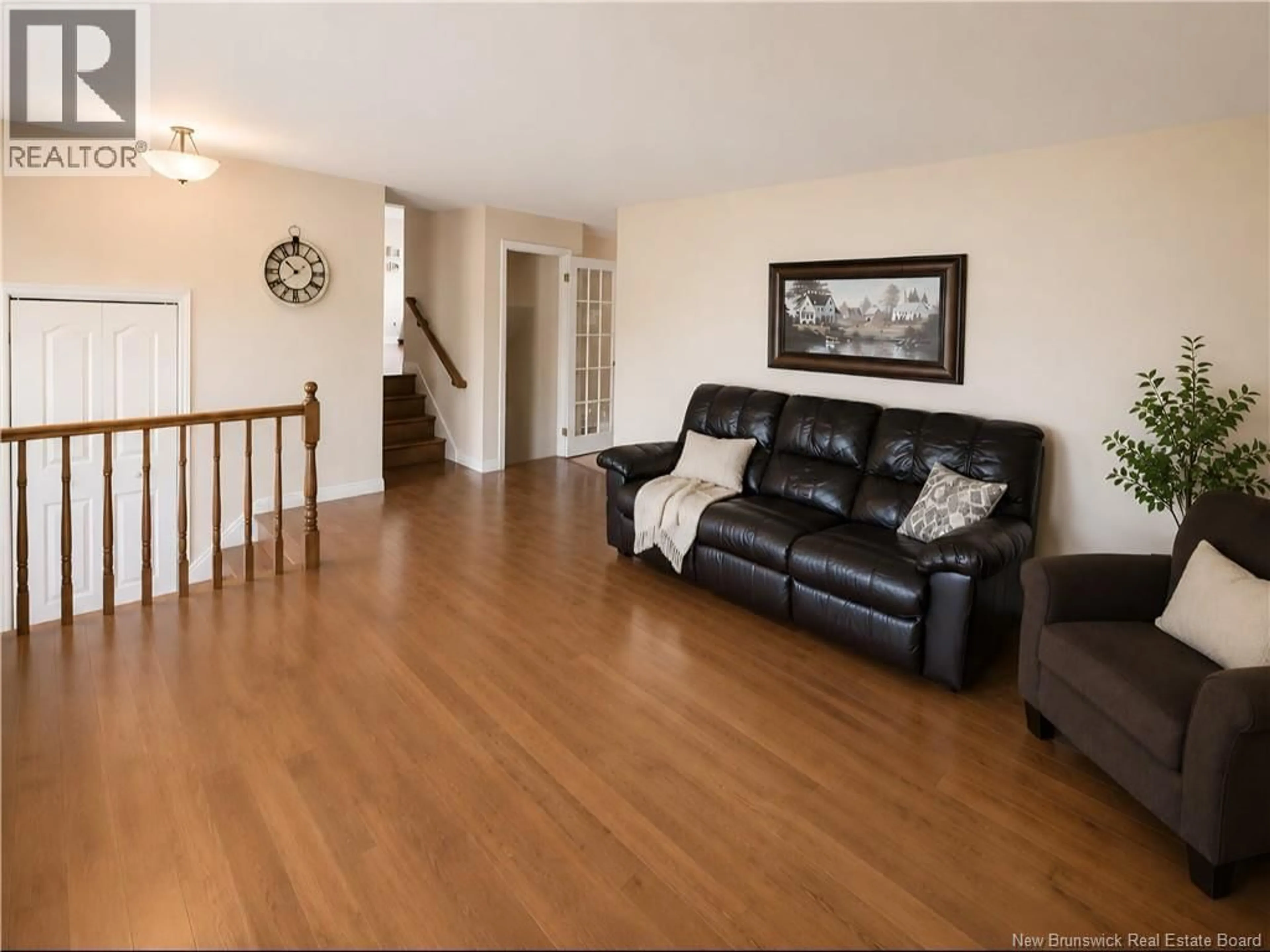 Living room with furniture, wood/laminate floor for 11 PEMBROKE CRESCENT, Riverview New Brunswick E1B3Z9