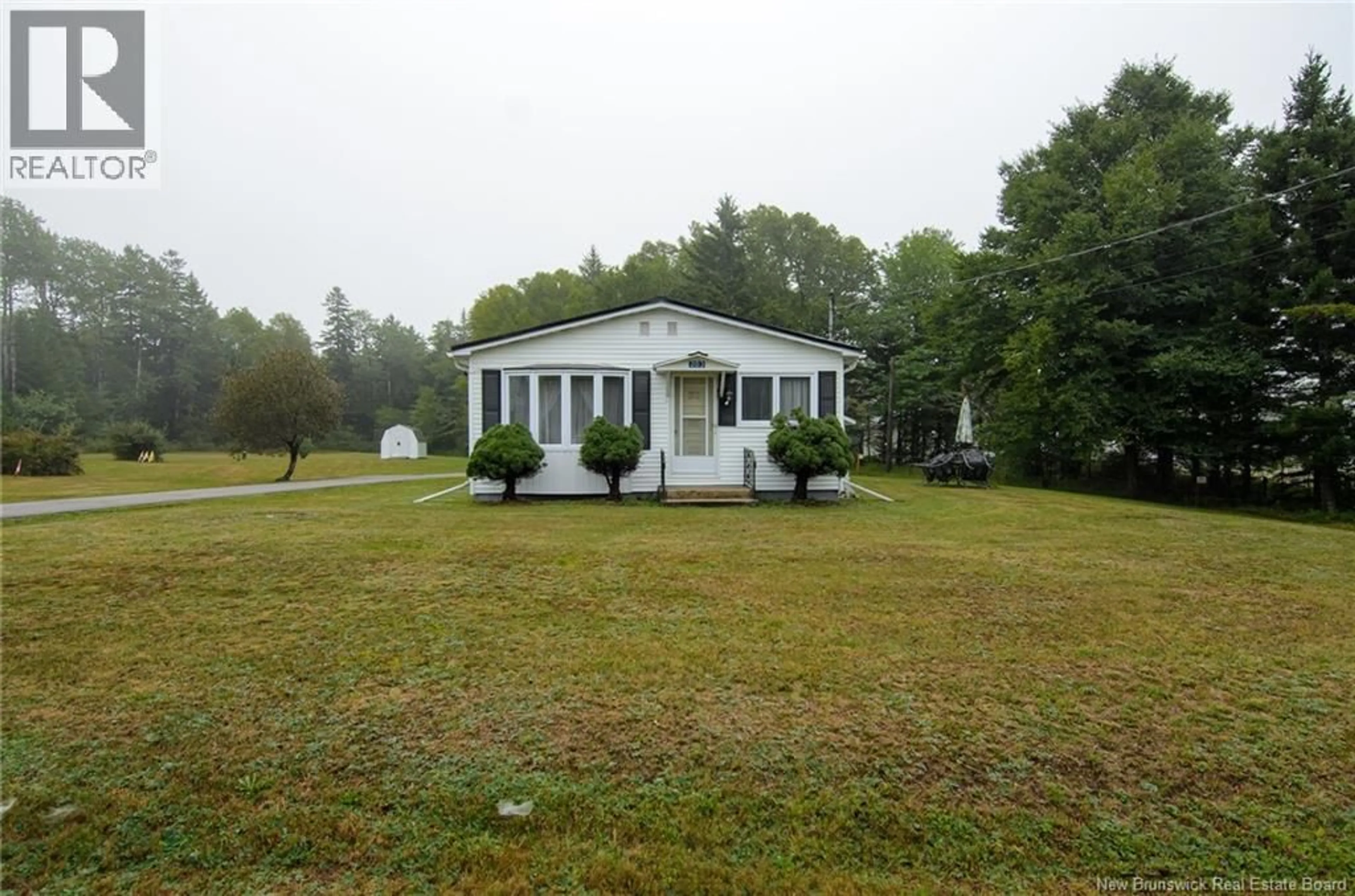A pic from outside/outdoor area/front of a property/back of a property/a pic from drone, building for 203 ROUTE 176, Pennfield New Brunswick E5H1V1