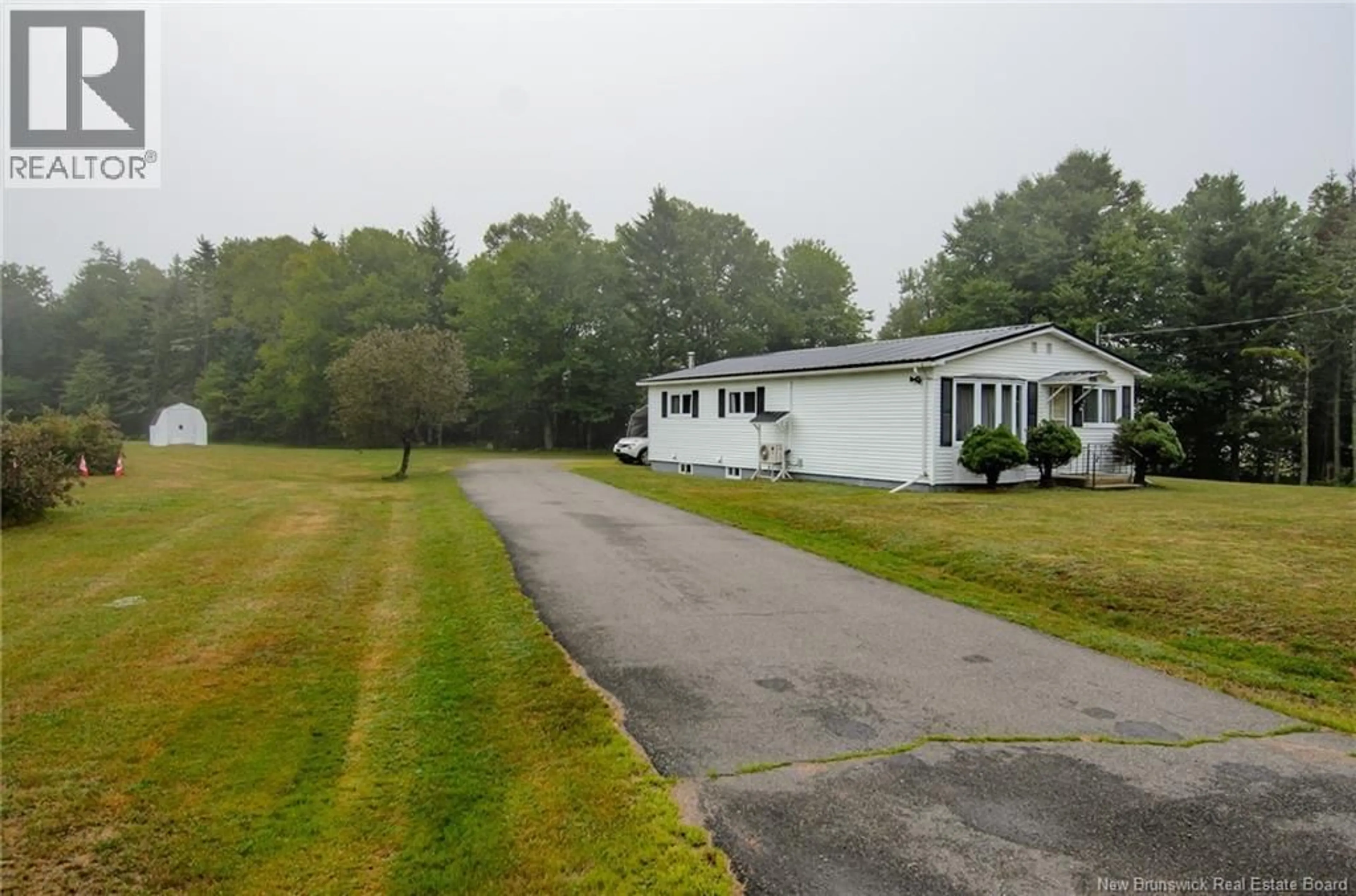 A pic from outside/outdoor area/front of a property/back of a property/a pic from drone, unknown for 203 ROUTE 176, Pennfield New Brunswick E5H1V1