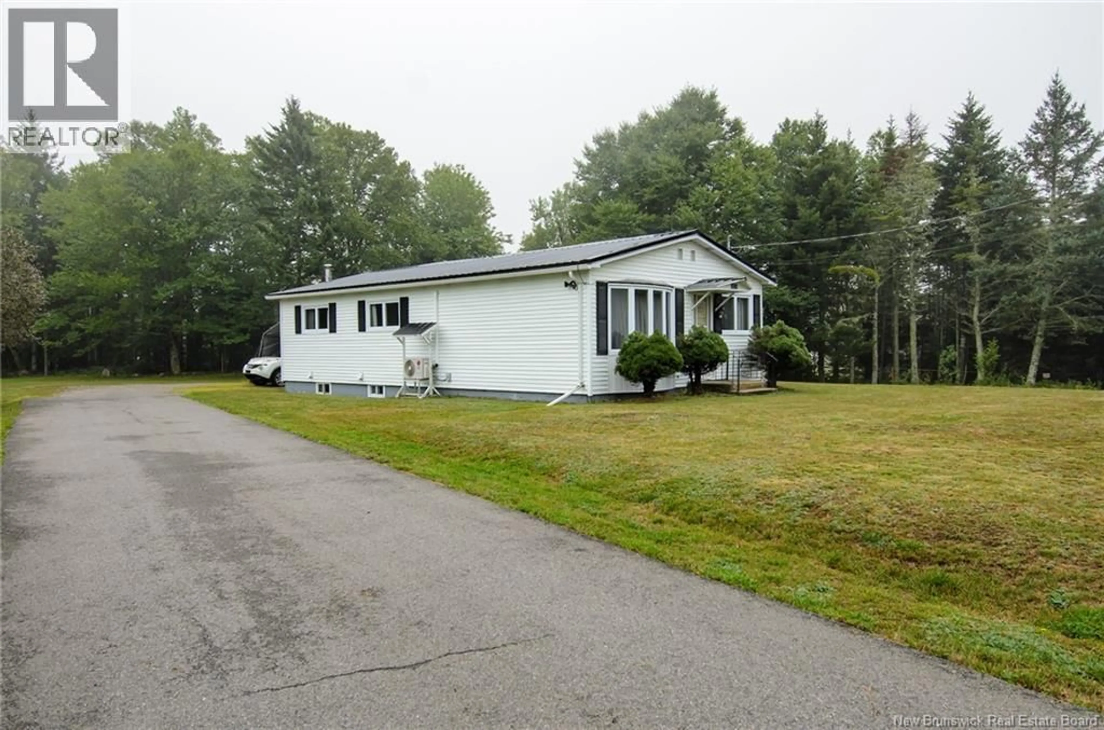 Home with vinyl exterior material, street for 203 ROUTE 176, Pennfield New Brunswick E5H1V1