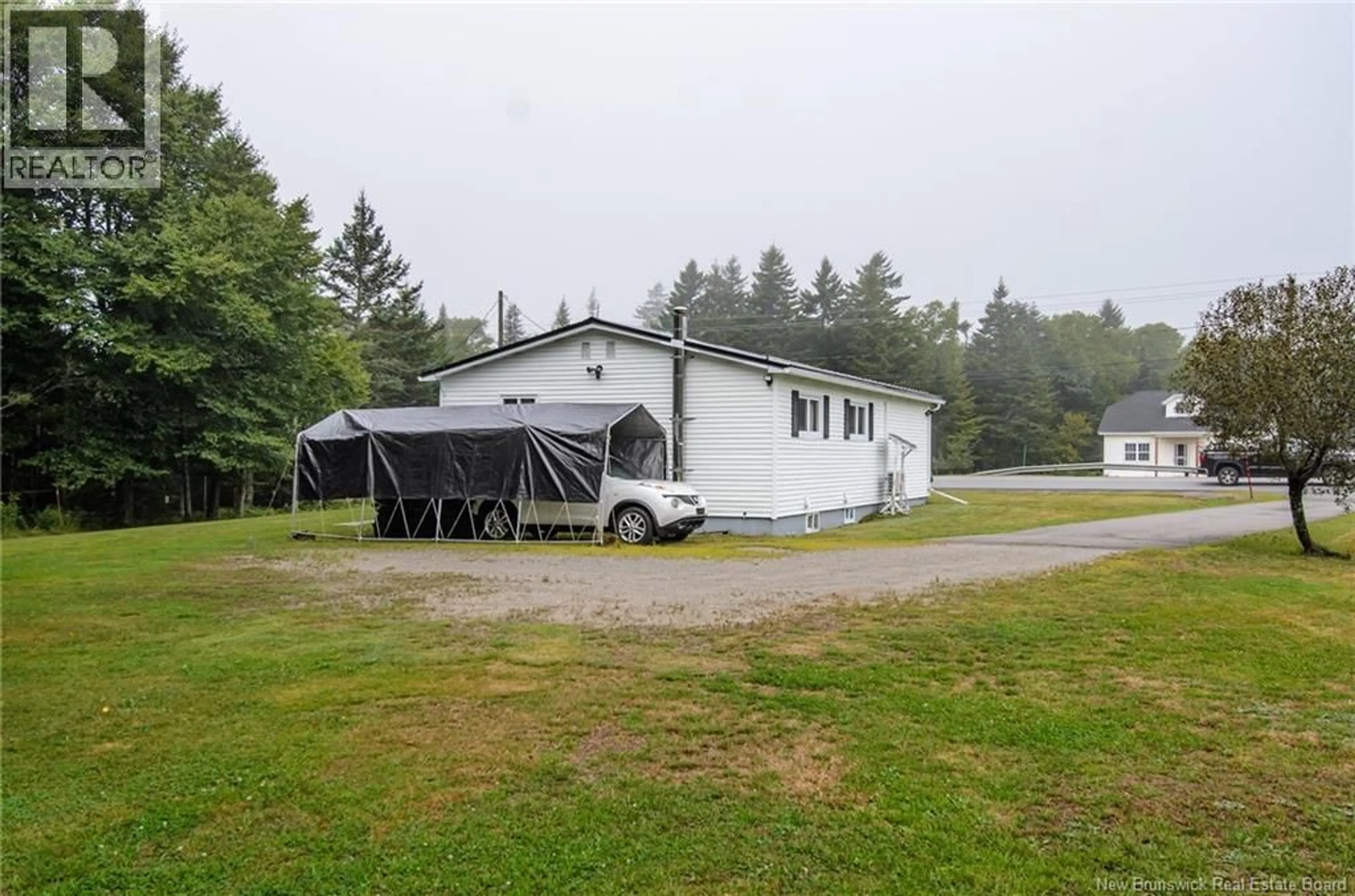 A pic from outside/outdoor area/front of a property/back of a property/a pic from drone, water/lake/river/ocean view for 203 ROUTE 176, Pennfield New Brunswick E5H1V1