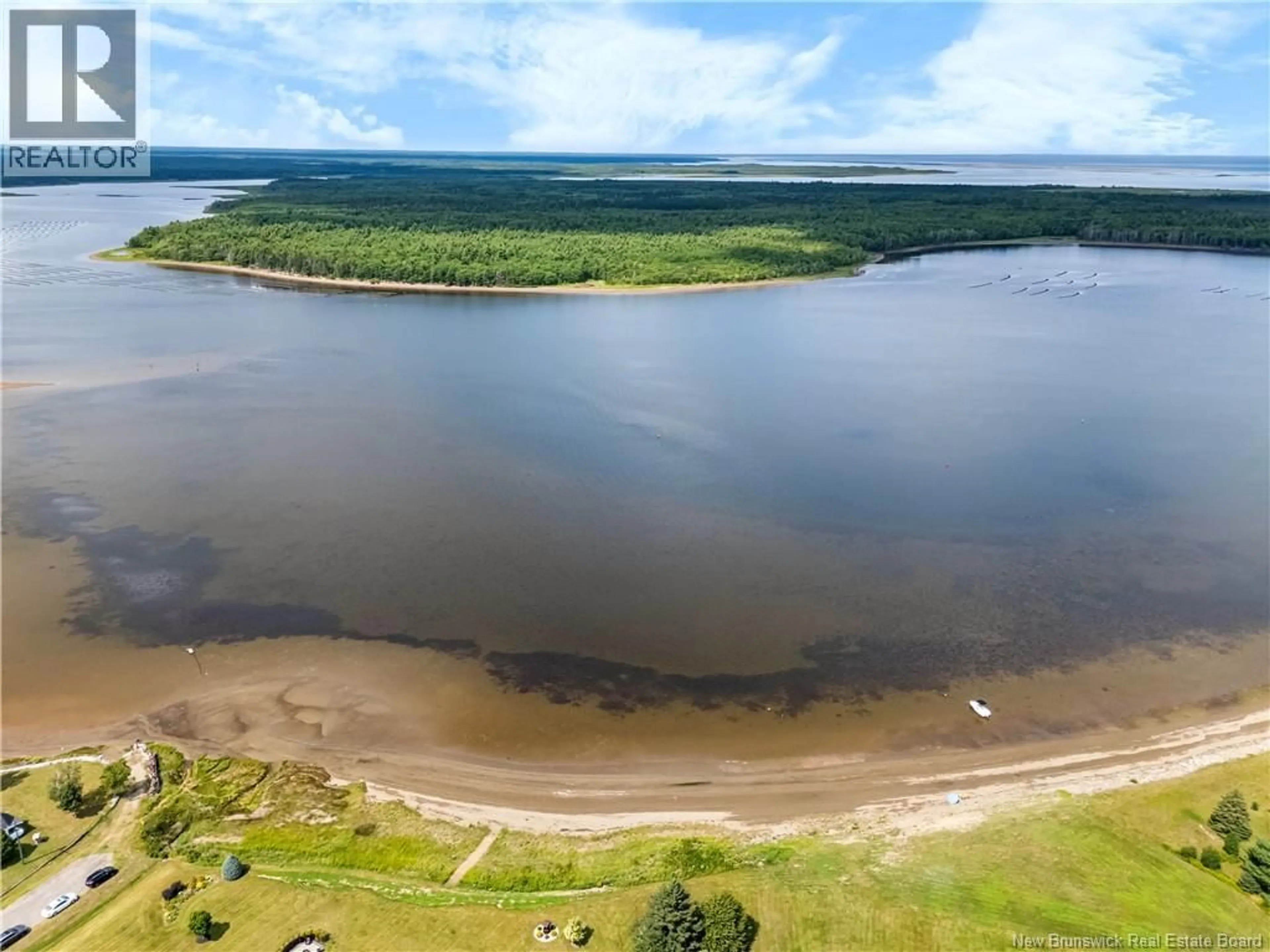 A pic from outside/outdoor area/front of a property/back of a property/a pic from drone, water/lake/river/ocean view for 31-33 BEN DAIGLE, Aldouane New Brunswick E4W5A3