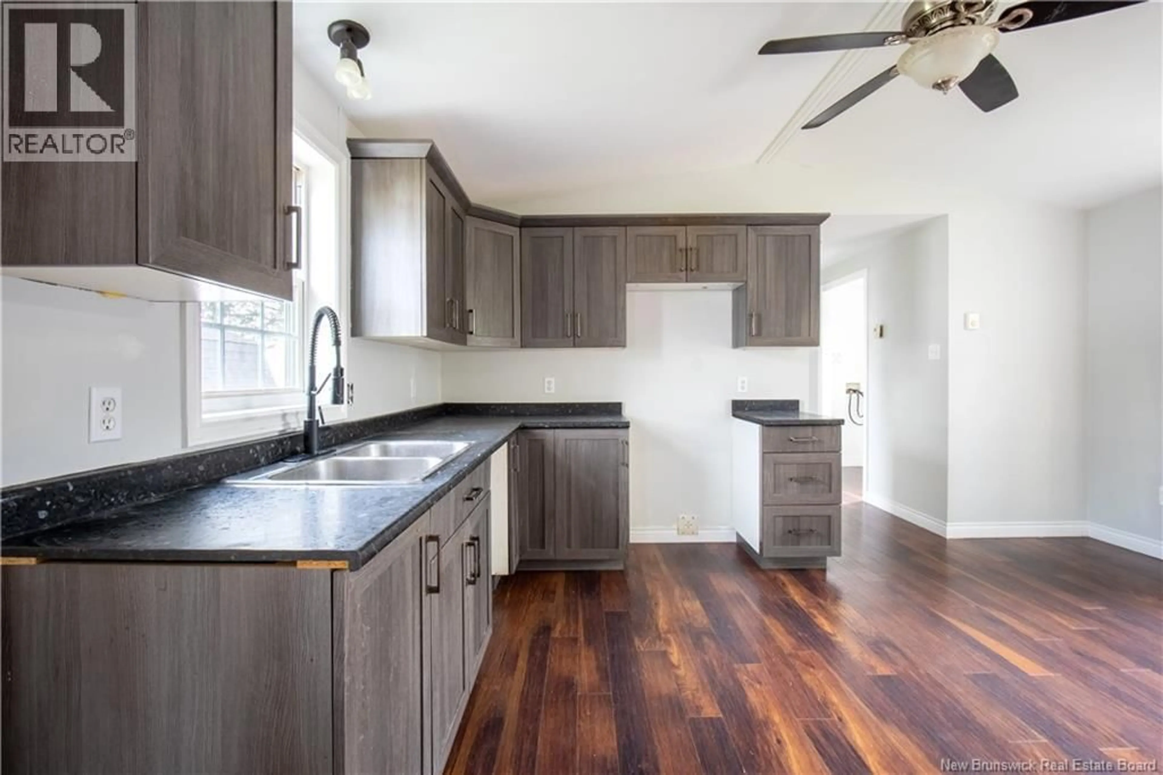 Open concept kitchen, wood/laminate floor for 5 NANCY STREET, Moncton New Brunswick E1E3T2