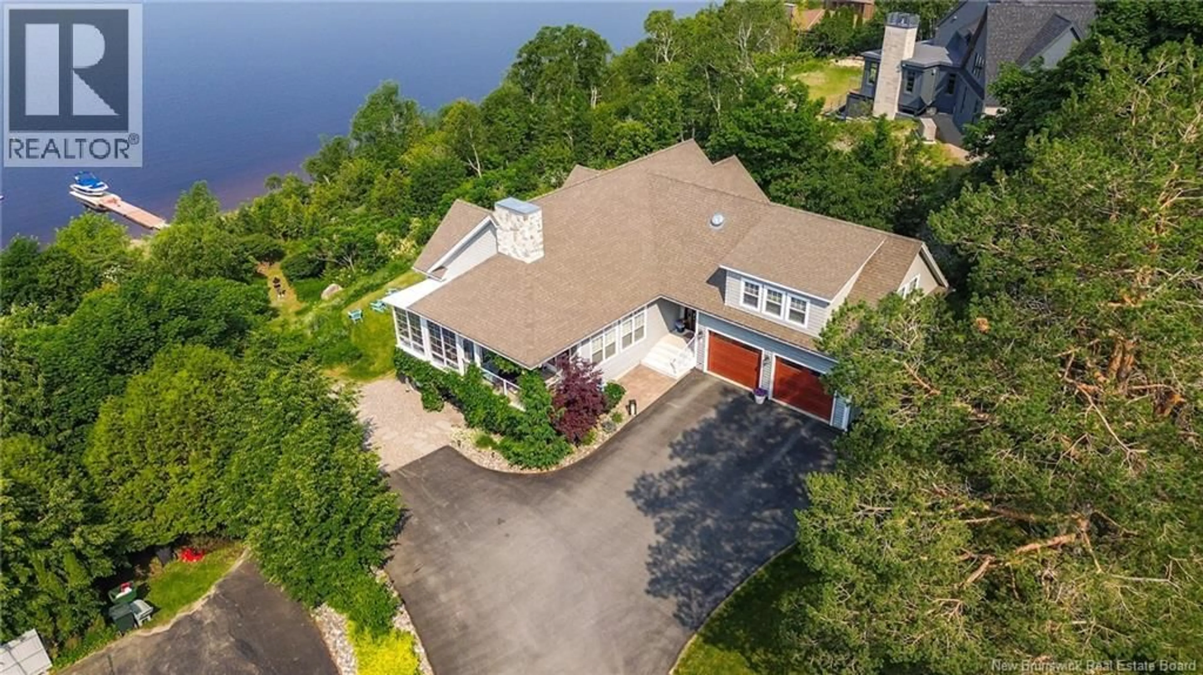 A pic from outside/outdoor area/front of a property/back of a property/a pic from drone, water/lake/river/ocean view for 73 ELIZABETH PARKWAY, Rothesay New Brunswick E2H1E8