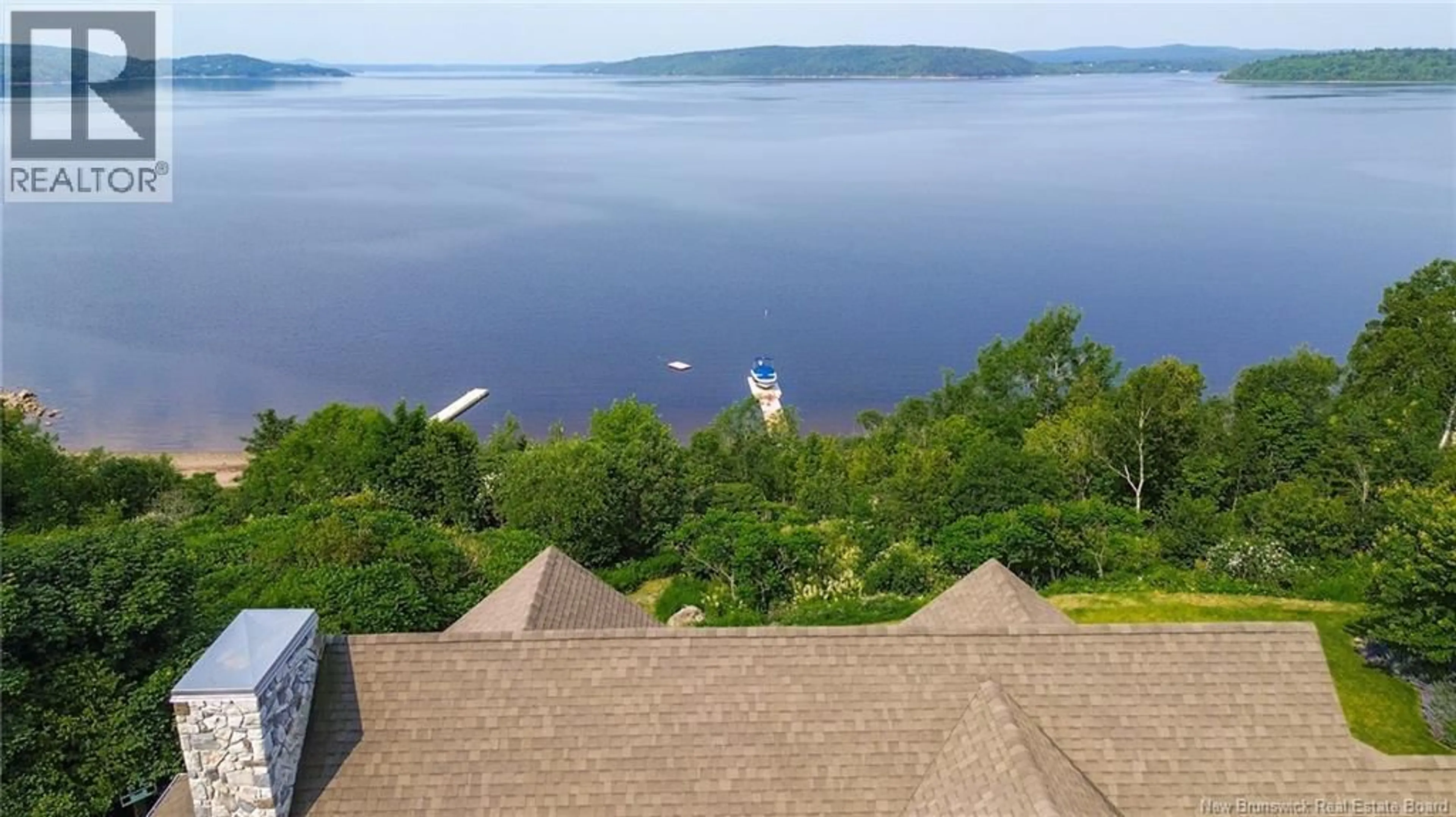 A pic from outside/outdoor area/front of a property/back of a property/a pic from drone, water/lake/river/ocean view for 73 ELIZABETH PARKWAY, Rothesay New Brunswick E2H1E8