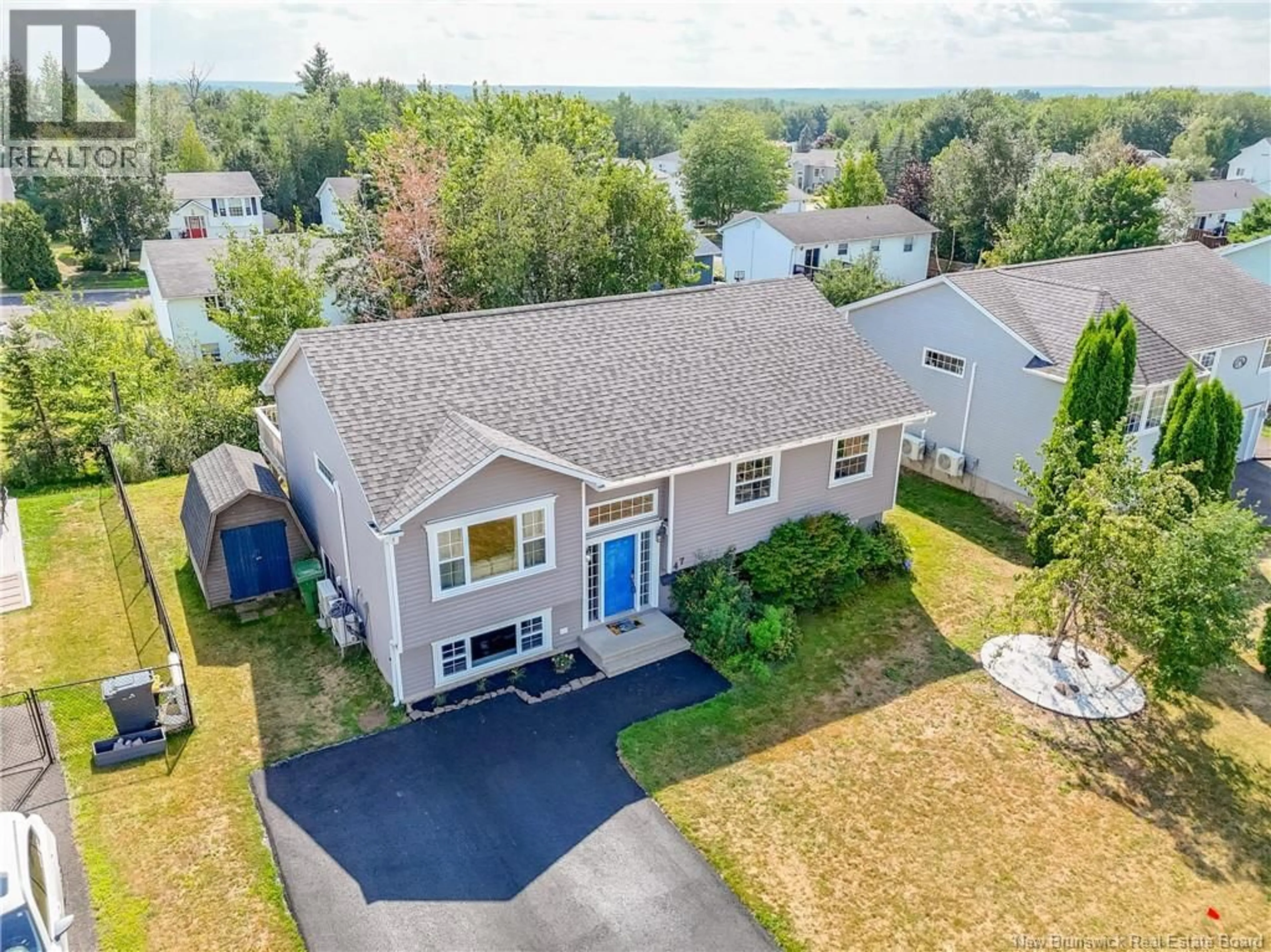 A pic from outside/outdoor area/front of a property/back of a property/a pic from drone, street for 47 DAWSON DRIVE, Oromocto New Brunswick E2V4S9