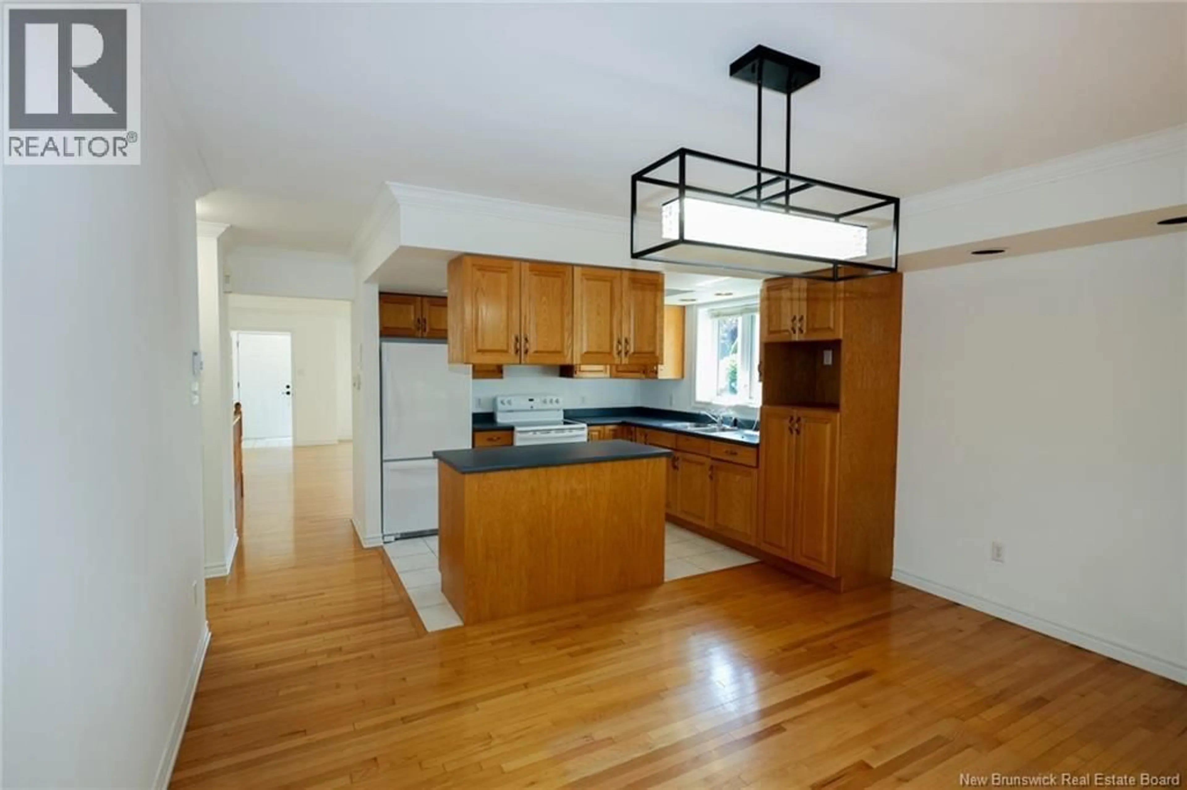 Open concept kitchen, wood/laminate floor for 23 KATHERINE LANE, Fredericton New Brunswick E3B9J9