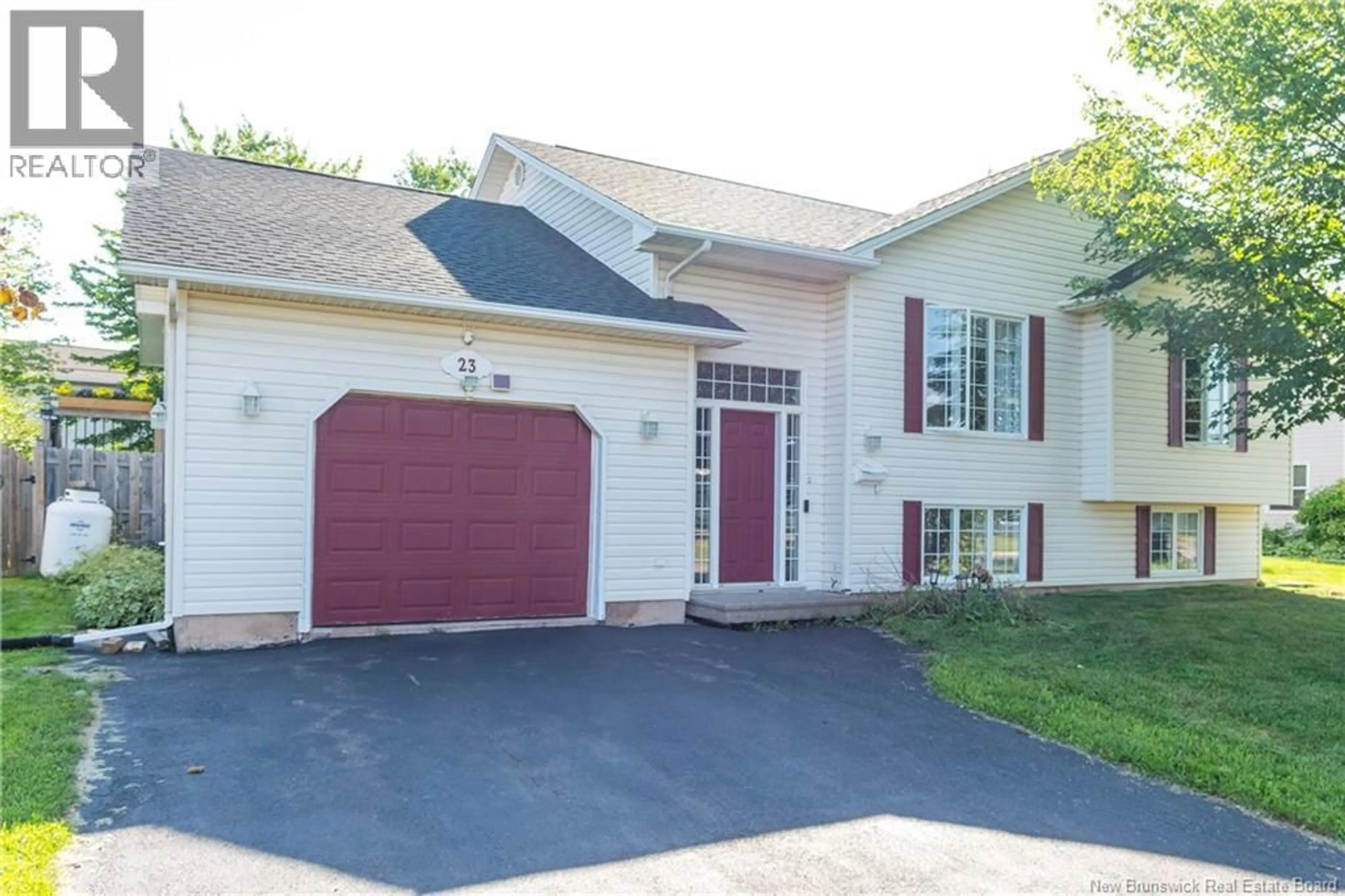 Home with vinyl exterior material, street for 23 HILLARY CRESCENT, Moncton New Brunswick E1C0A8