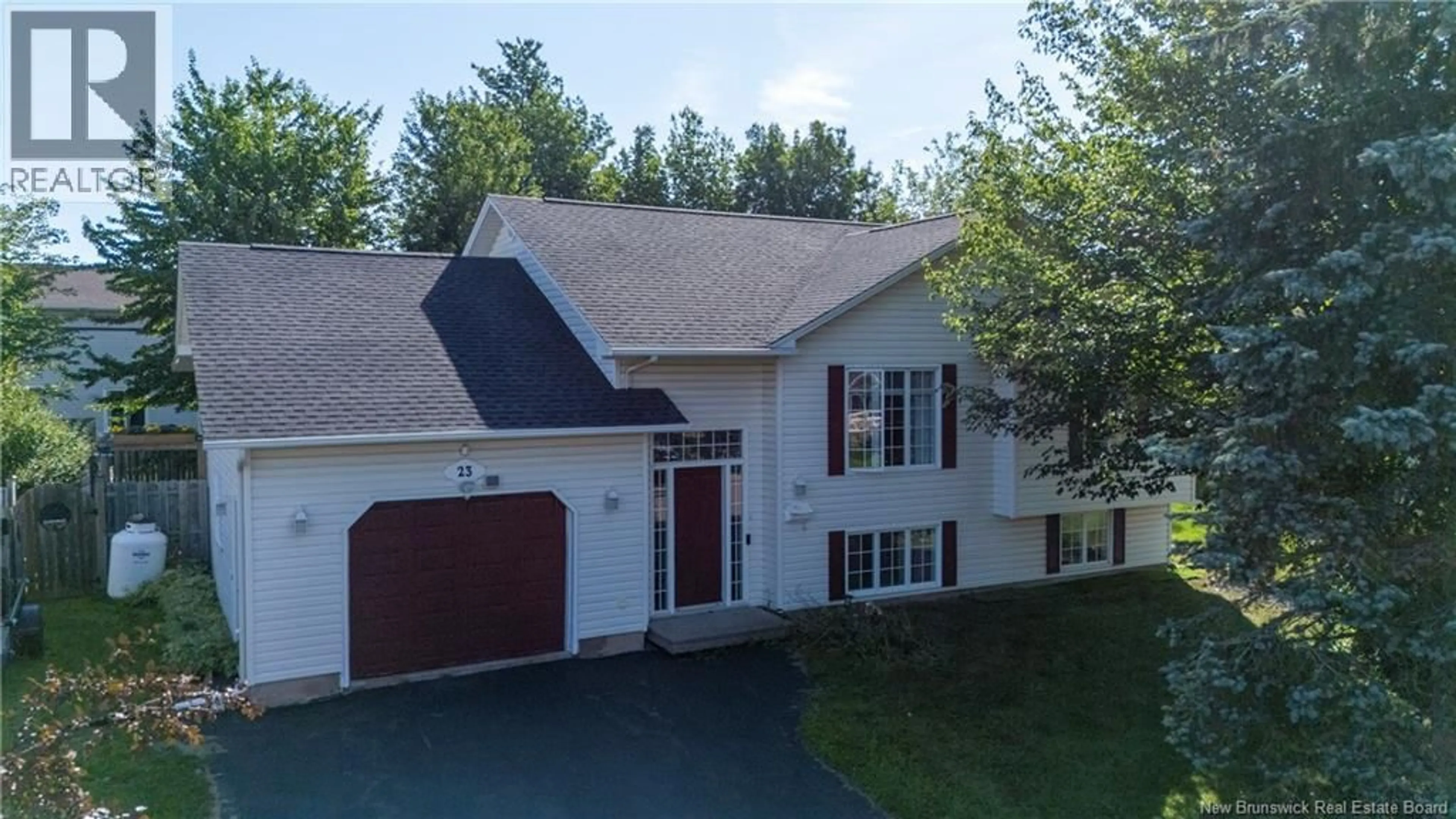 Home with vinyl exterior material, street for 23 HILLARY CRESCENT, Moncton New Brunswick E1C0A8