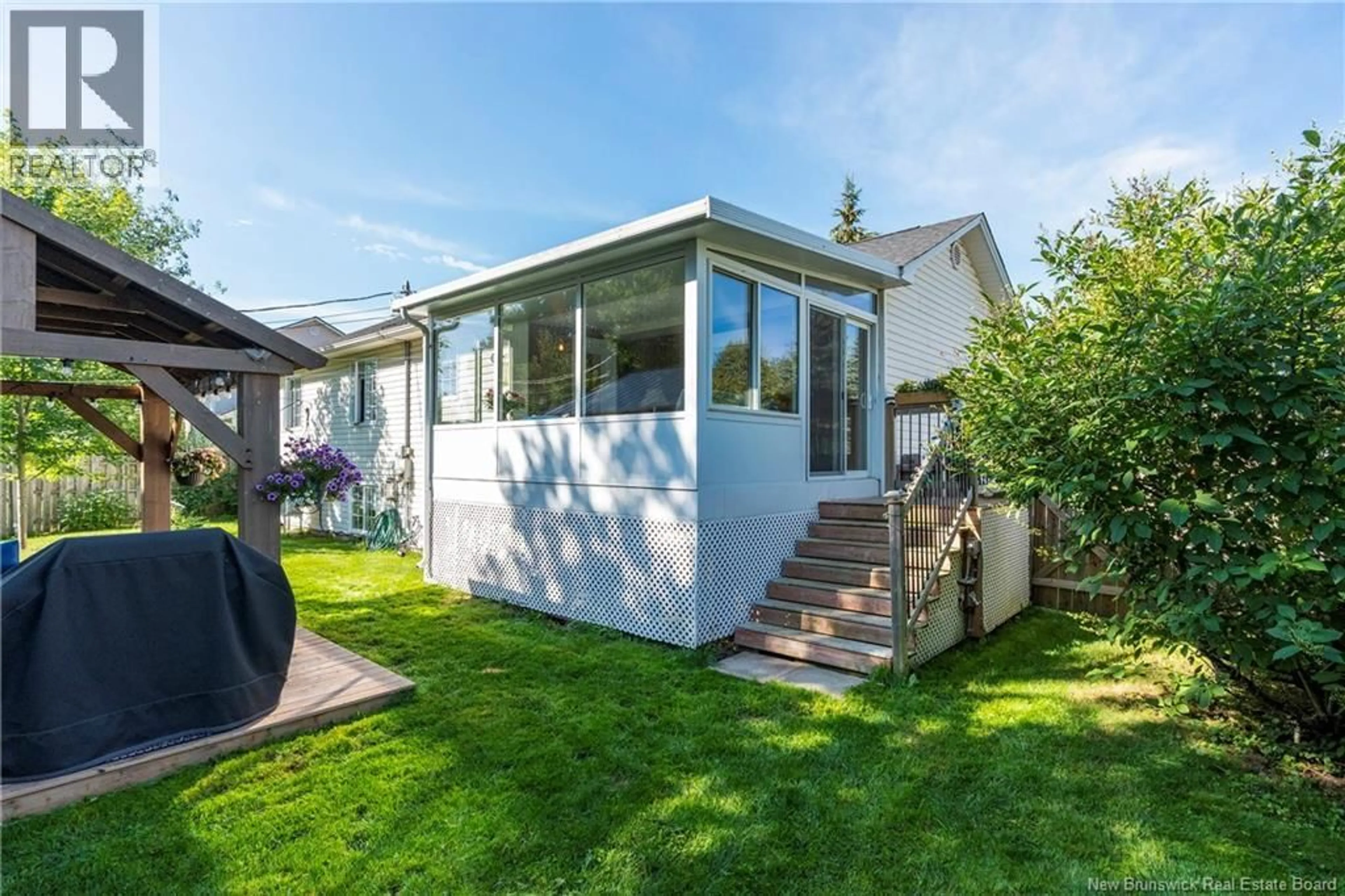 Home with vinyl exterior material, street for 23 HILLARY CRESCENT, Moncton New Brunswick E1C0A8