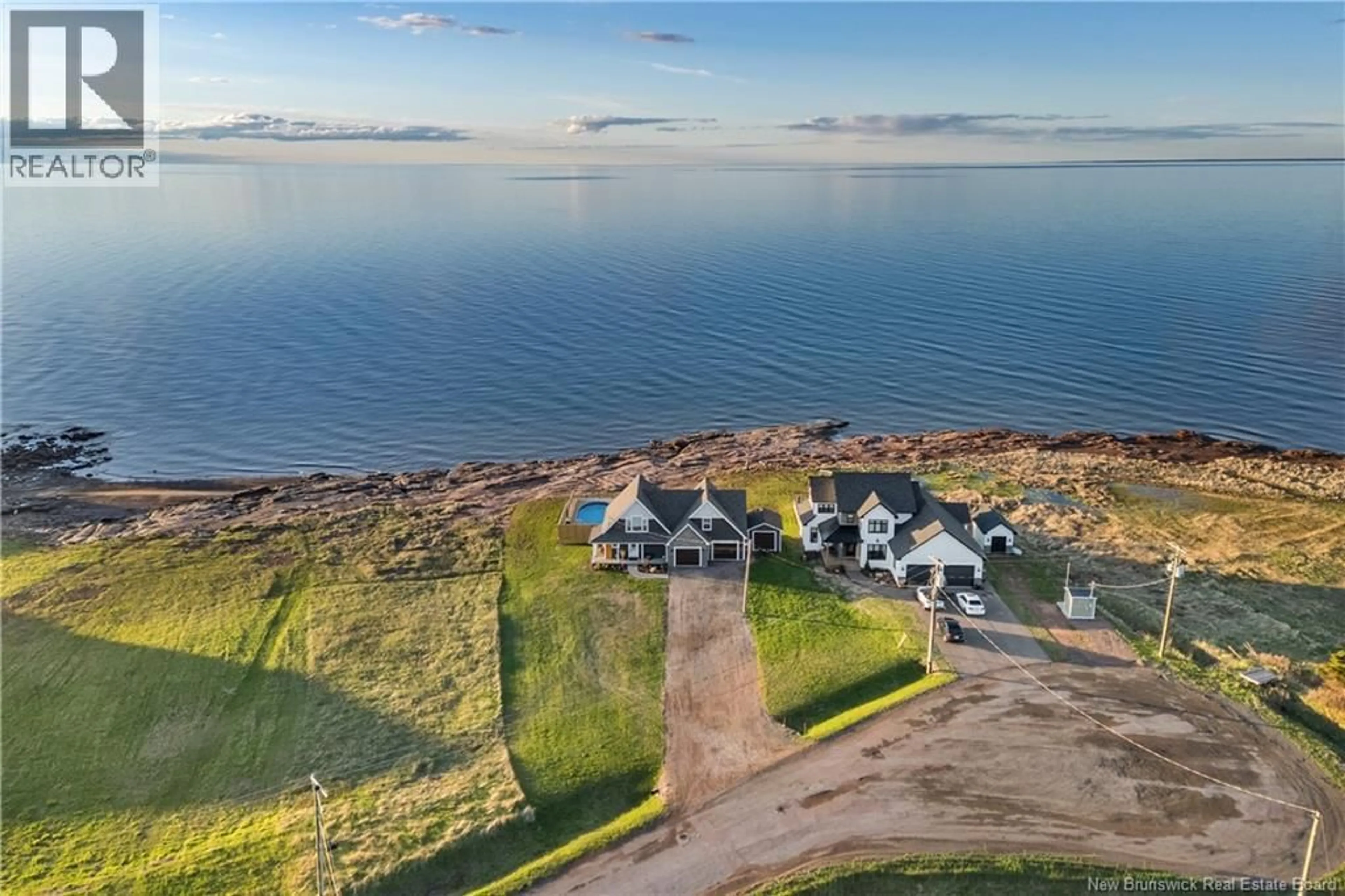 A pic from outside/outdoor area/front of a property/back of a property/a pic from drone, water/lake/river/ocean view for 12 MACON LANE, Cap-Pelé New Brunswick E4P1X2