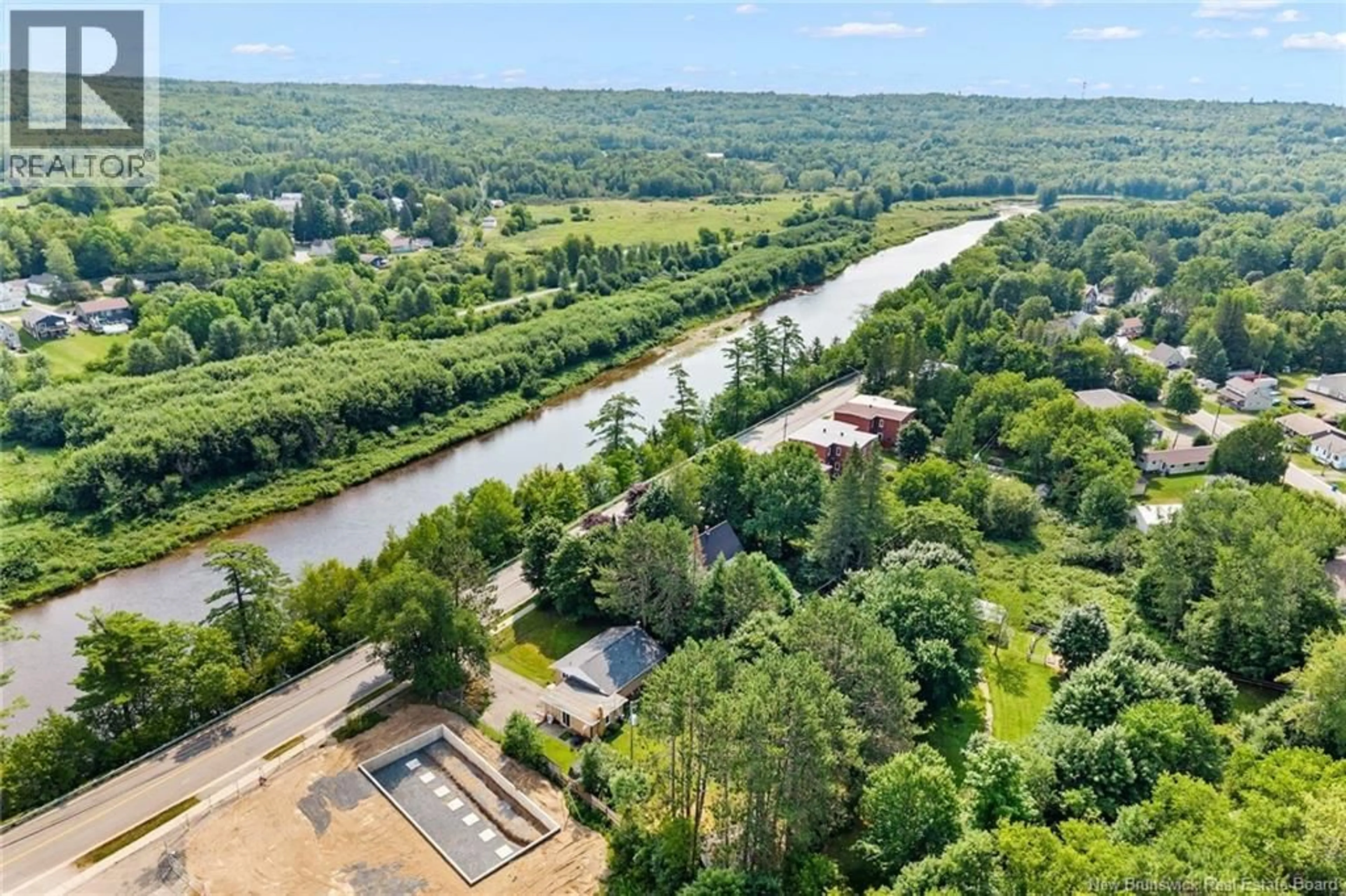 A pic from outside/outdoor area/front of a property/back of a property/a pic from drone, water/lake/river/ocean view for 205 CANADA STREET, Fredericton New Brunswick E3A3Z9