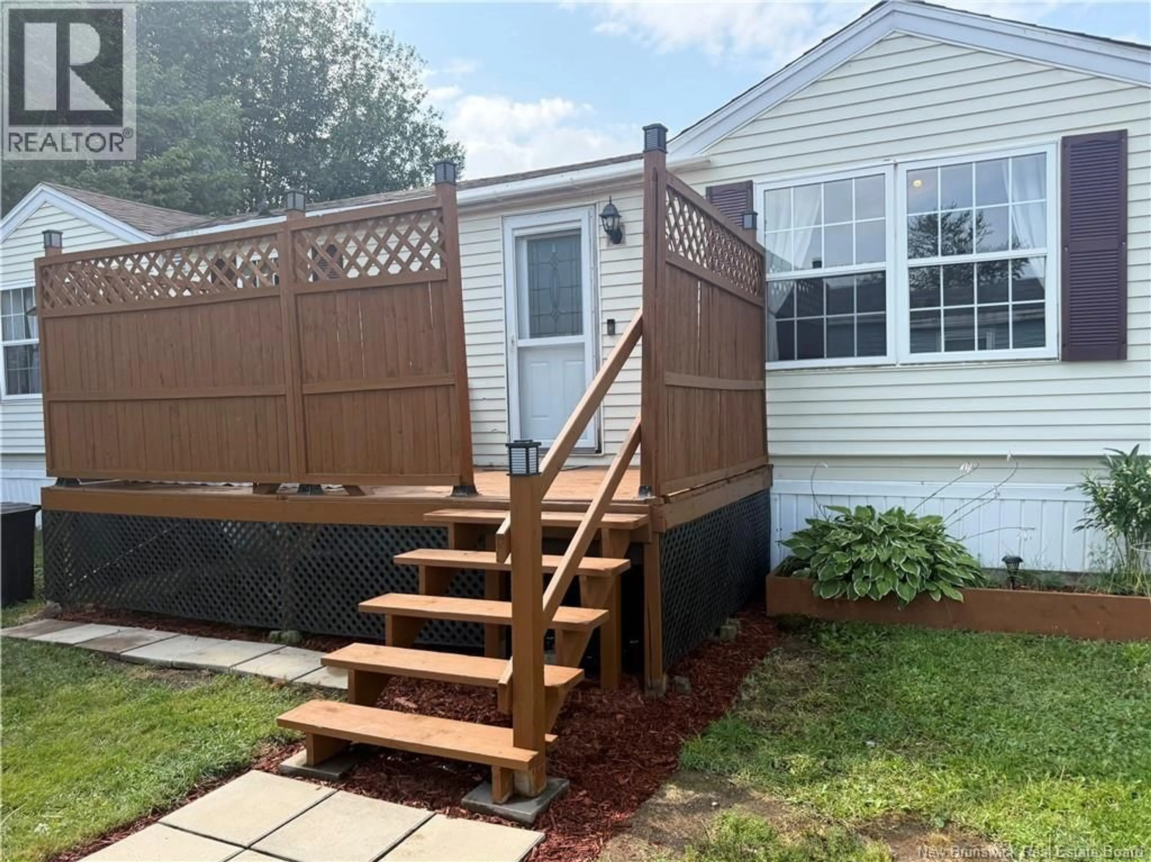Home with vinyl exterior material, street for 51 TRAVIS STREET, Miramichi New Brunswick E1V6A3