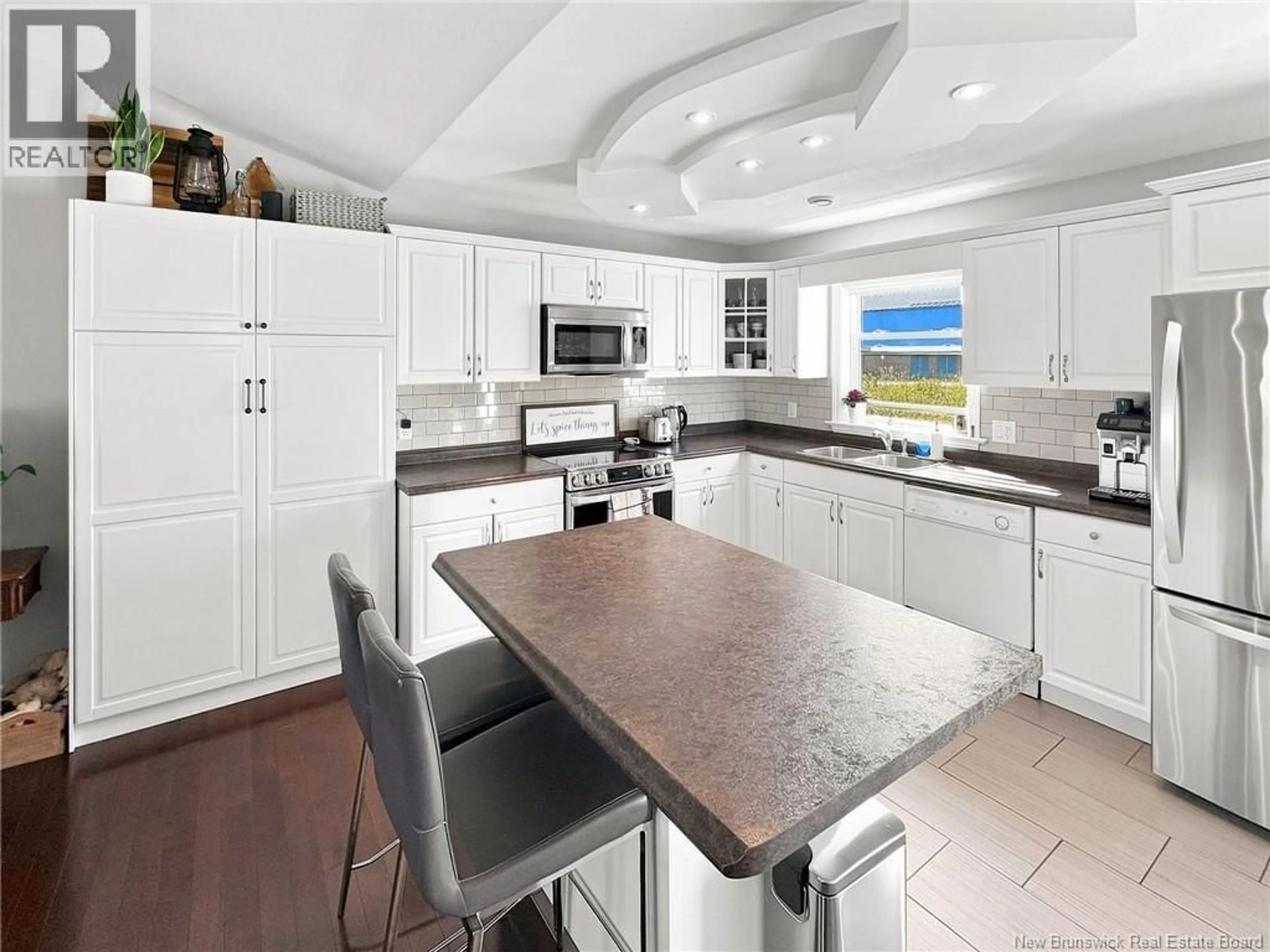 Open concept kitchen, ceramic/tile floor for 929 BERNARD STREET, Dieppe New Brunswick E1A4A6