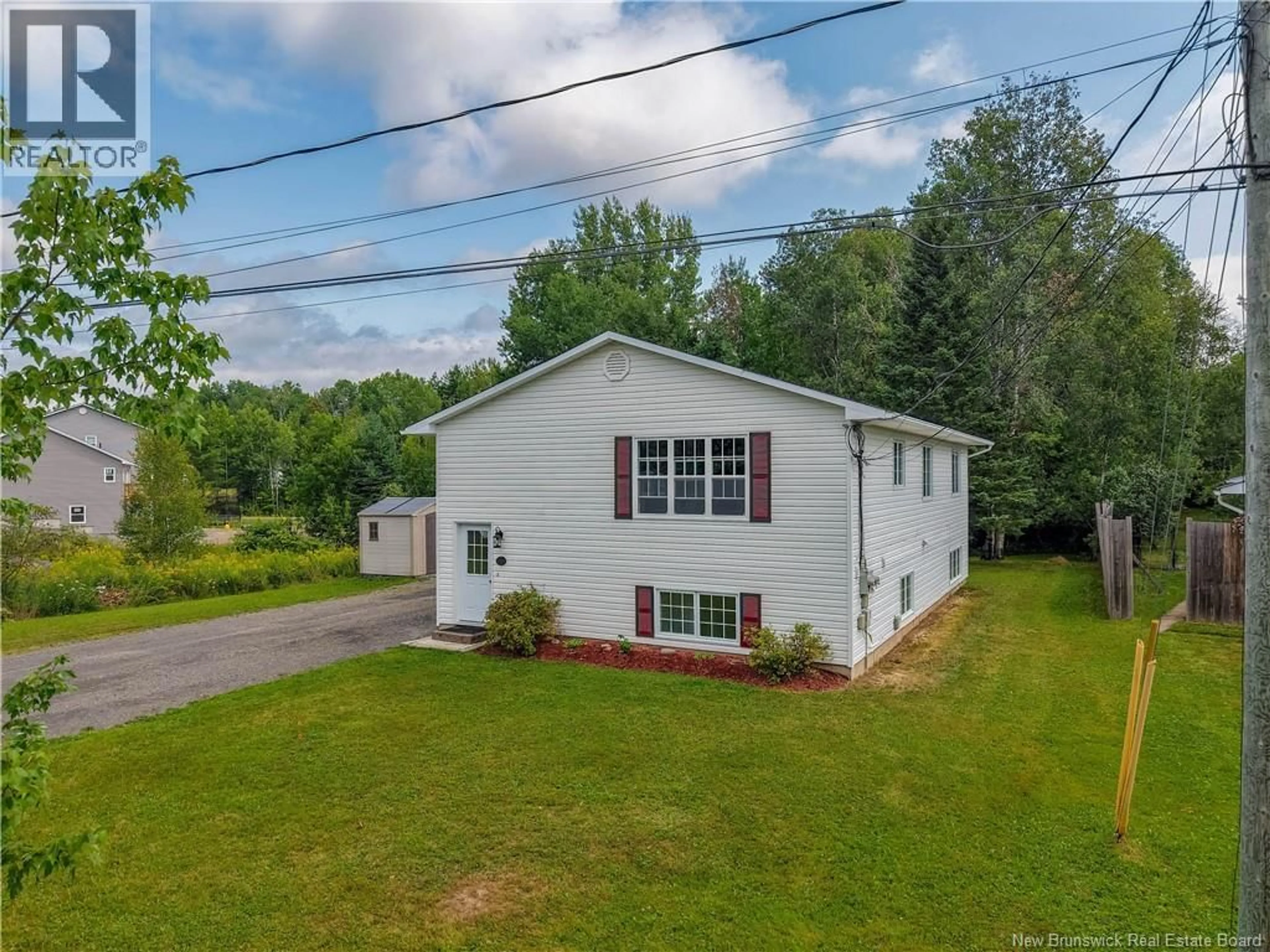 A pic from outside/outdoor area/front of a property/back of a property/a pic from drone, water/lake/river/ocean view for 29 MALIBU STREET, Fredericton New Brunswick E3A5P2