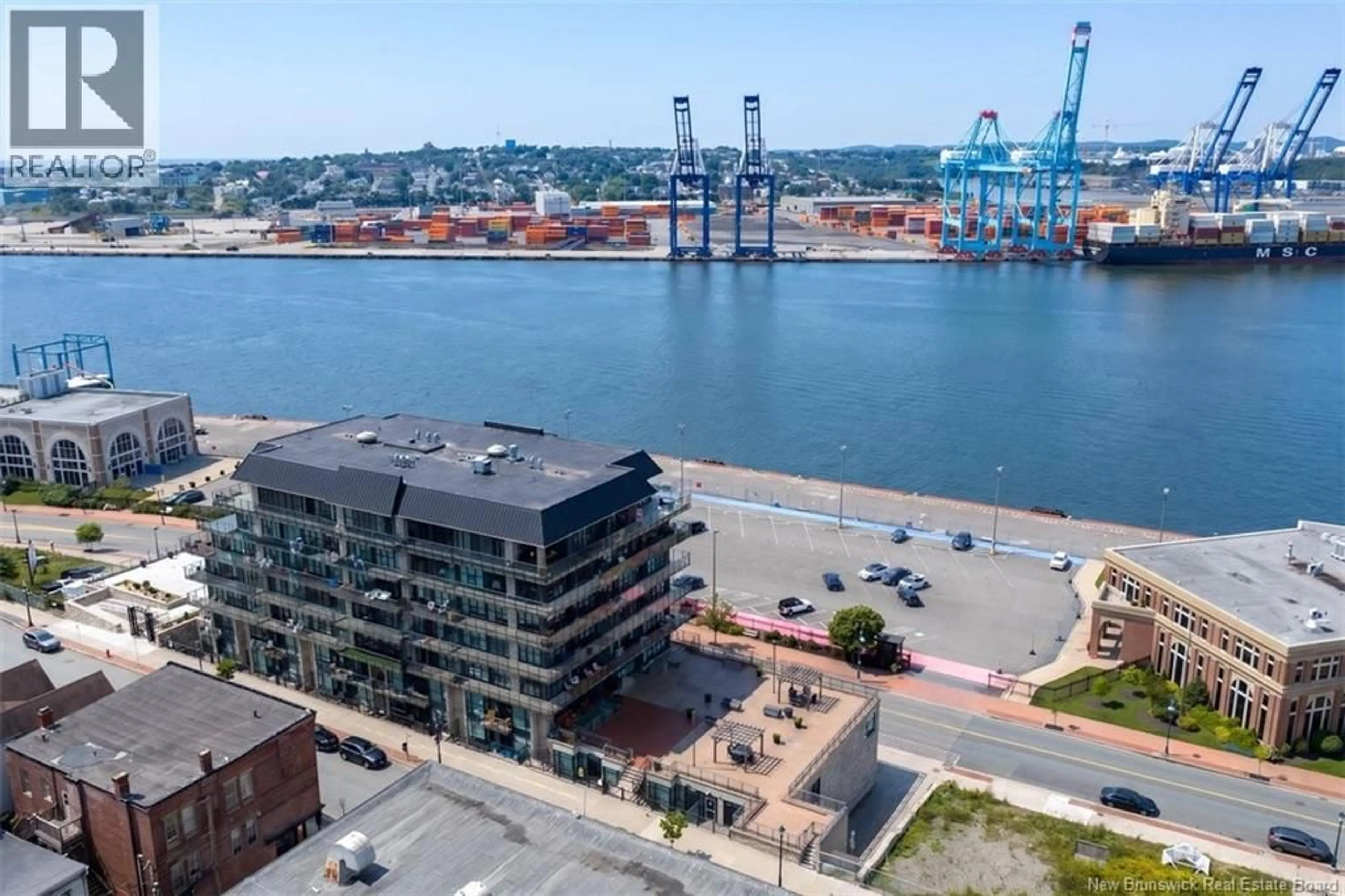 A pic from outside/outdoor area/front of a property/back of a property/a pic from drone, water/lake/river/ocean view for 102 - 242 WATER STREET, Saint John New Brunswick E2L0C5