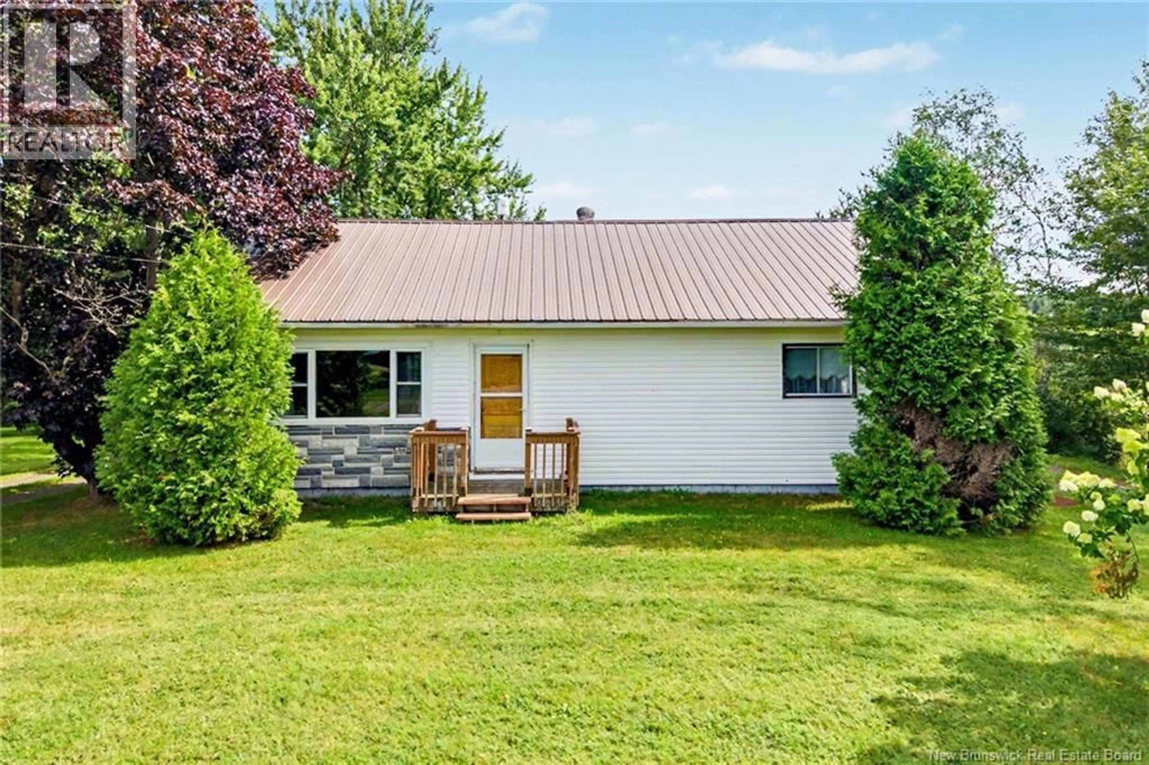 Home with vinyl exterior material, street for 6558 ROUTE 10, Upper Salmon Creek New Brunswick E4A1E5