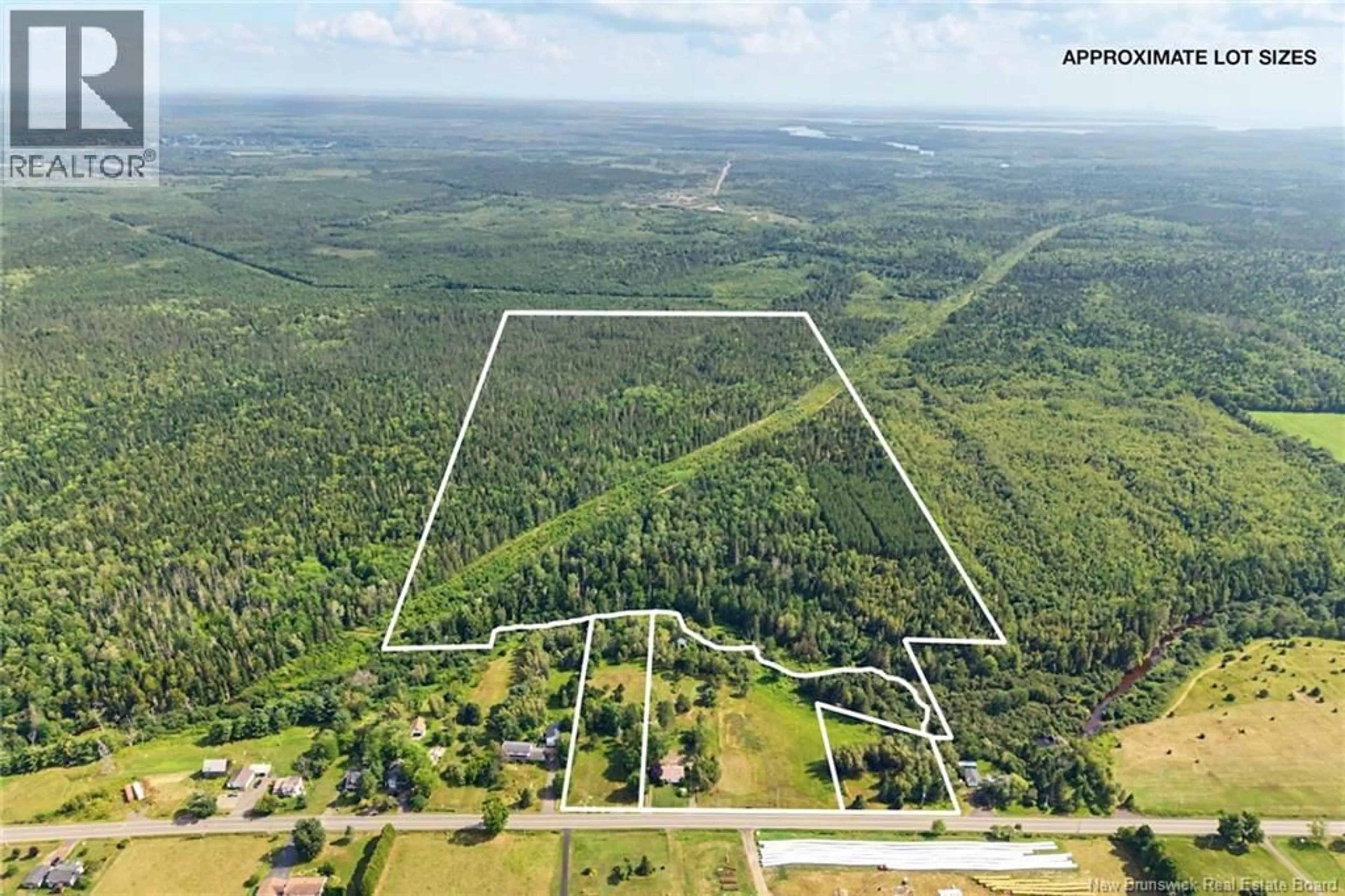 A pic from outside/outdoor area/front of a property/back of a property/a pic from drone, forest/trees view for 6558 ROUTE 10, Upper Salmon Creek New Brunswick E4A1E5
