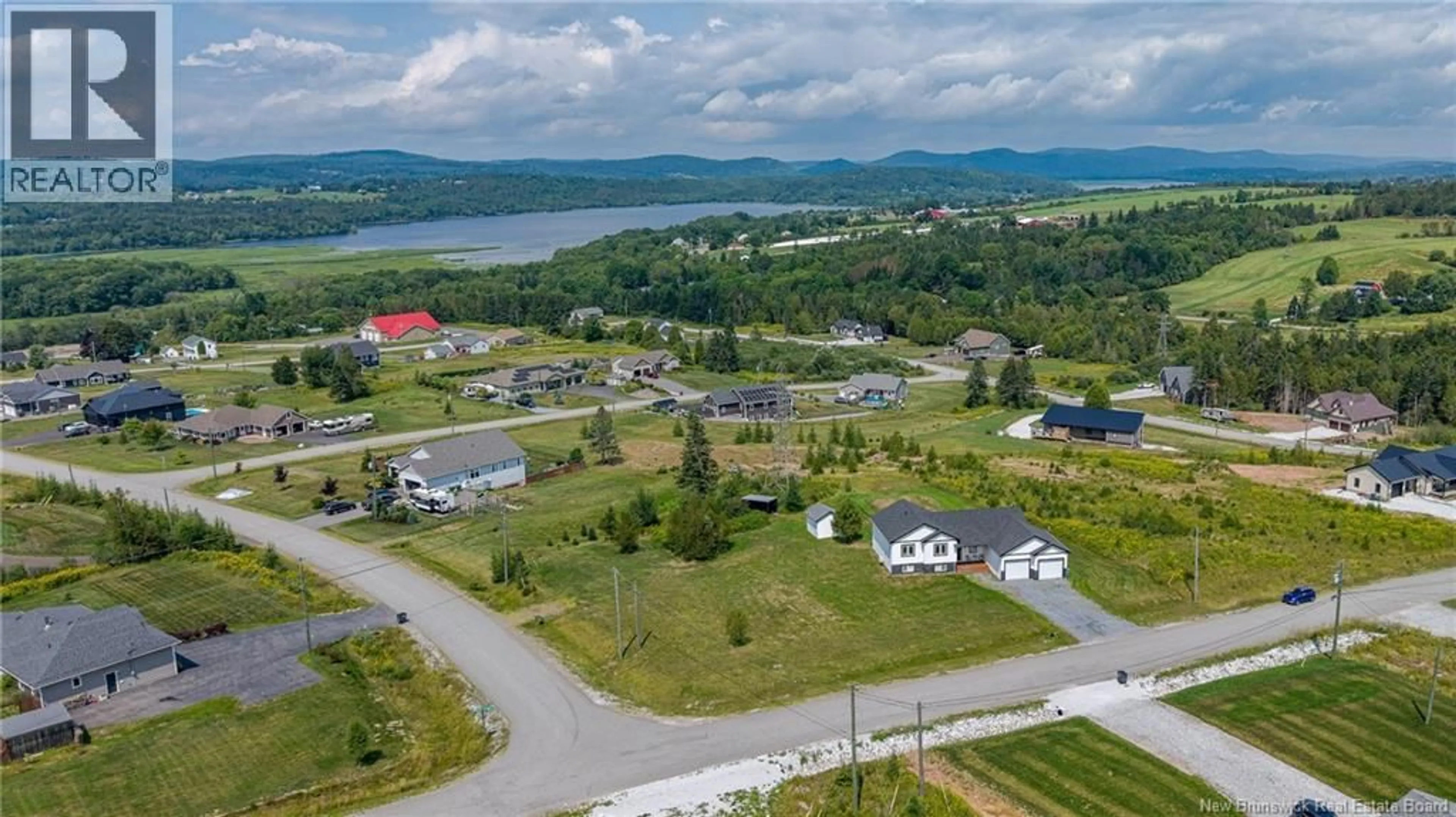 A pic from outside/outdoor area/front of a property/back of a property/a pic from drone, water/lake/river/ocean view for 34 MCMASTER AVENUE, Nauwigewauk New Brunswick E5N2B7