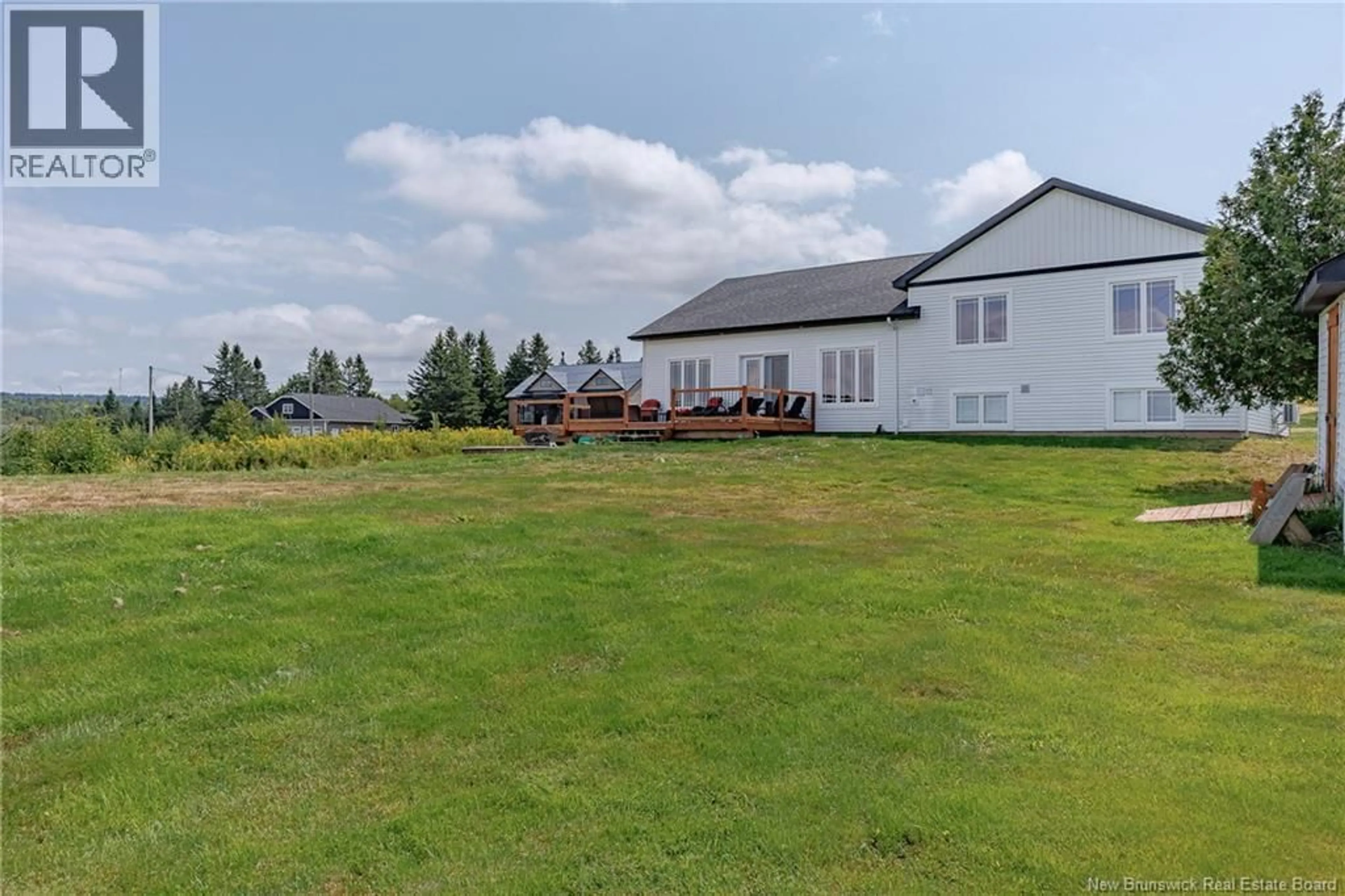 A pic from outside/outdoor area/front of a property/back of a property/a pic from drone, building for 34 MCMASTER AVENUE, Nauwigewauk New Brunswick E5N2B7