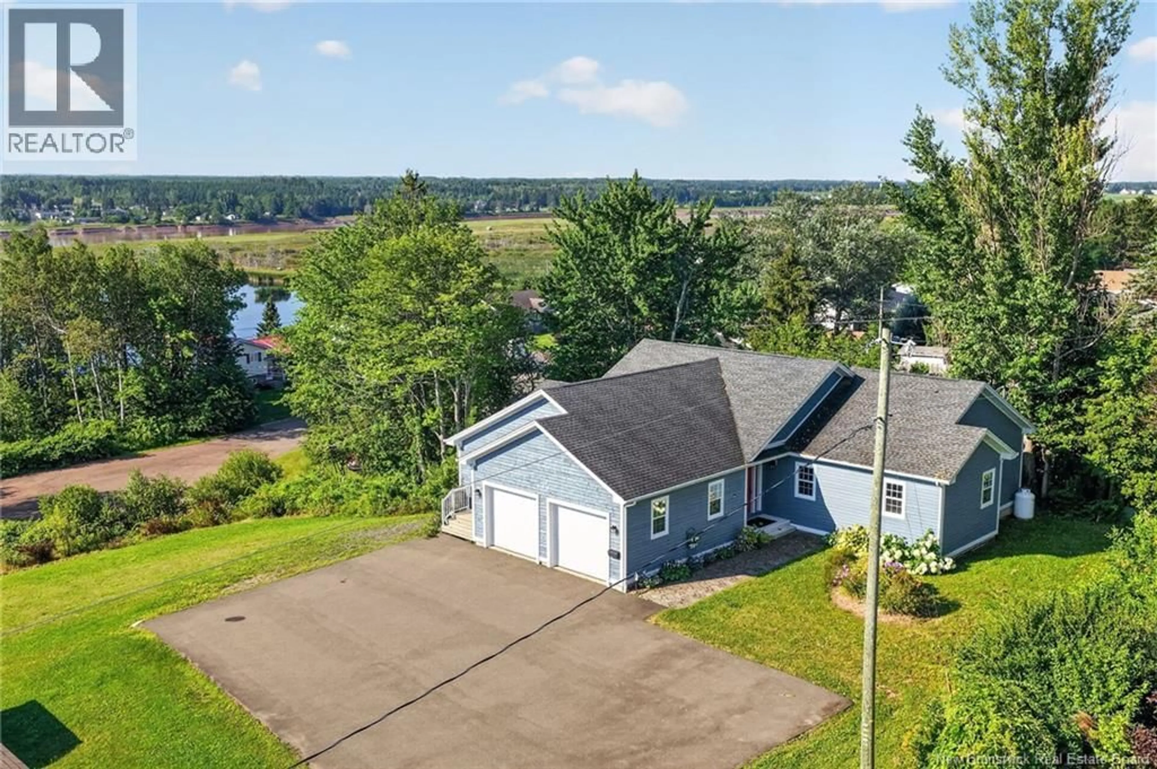 A pic from outside/outdoor area/front of a property/back of a property/a pic from drone, water/lake/river/ocean view for 282 BOND DRIVE, Moncton New Brunswick E1E4S4