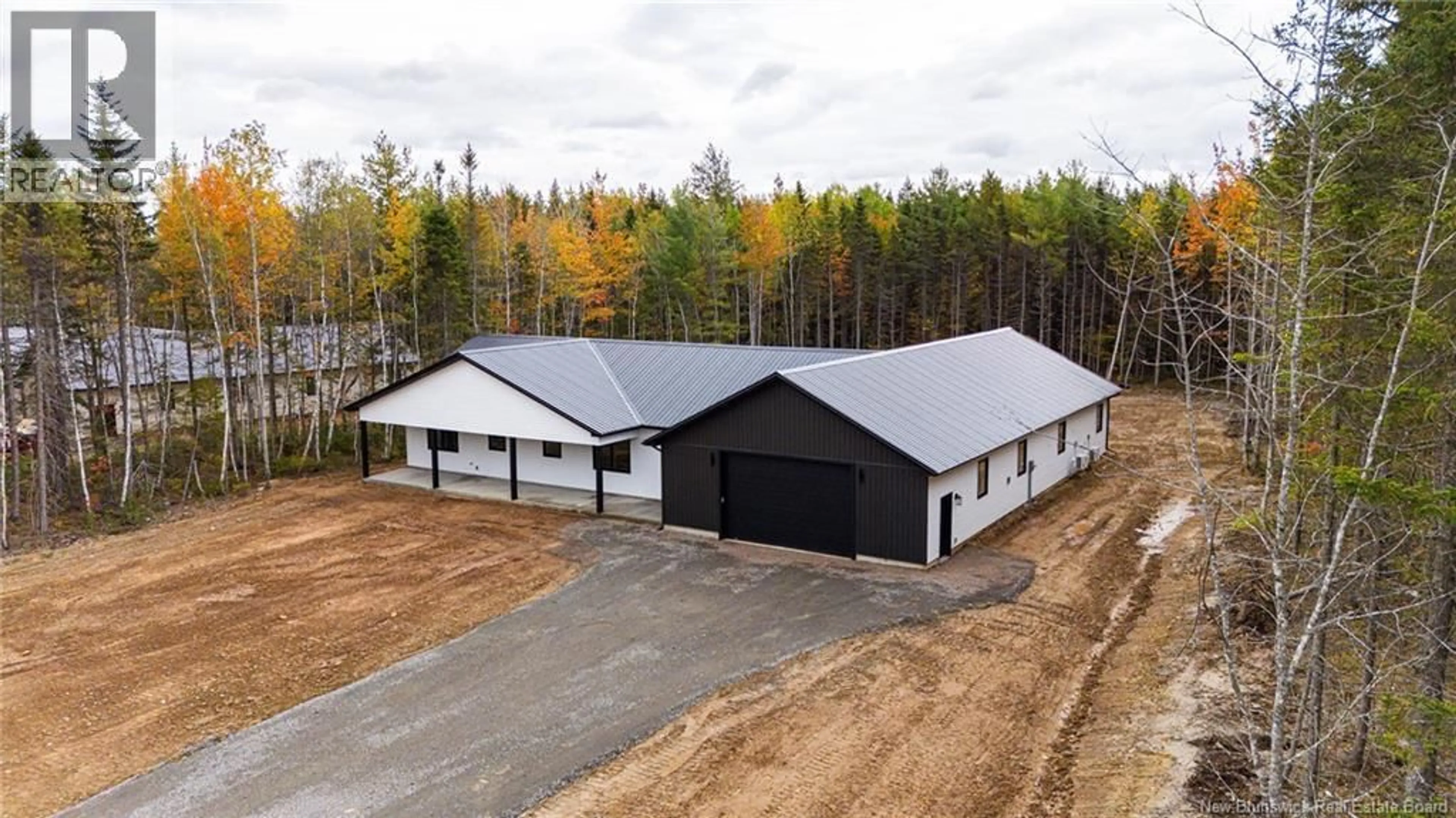A pic from outside/outdoor area/front of a property/back of a property/a pic from drone, building for 62 MAEFIELD STREET, Lower Coverdale New Brunswick E1J0B1