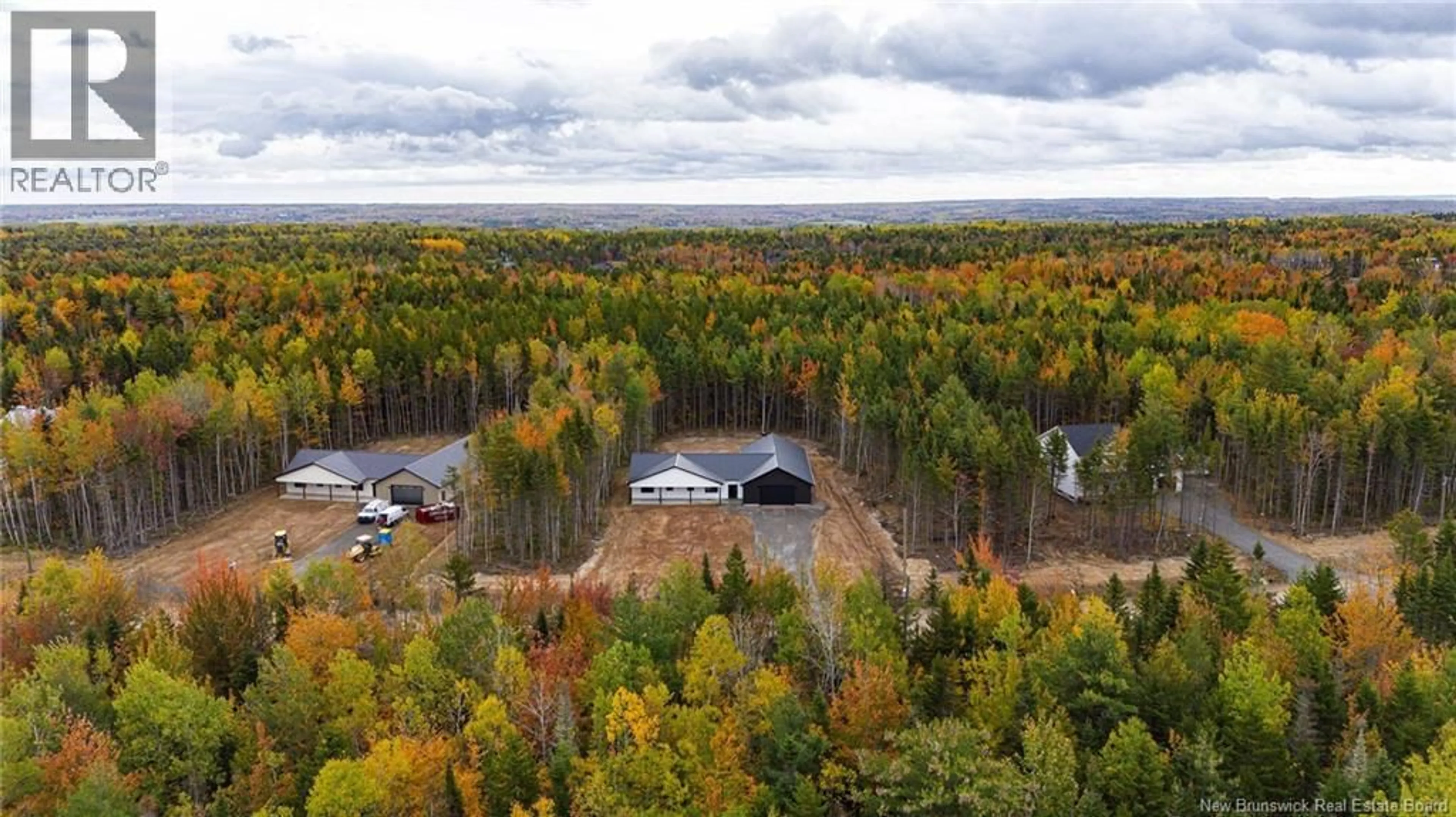 A pic from outside/outdoor area/front of a property/back of a property/a pic from drone, forest/trees view for 62 MAEFIELD STREET, Lower Coverdale New Brunswick E1J0B1