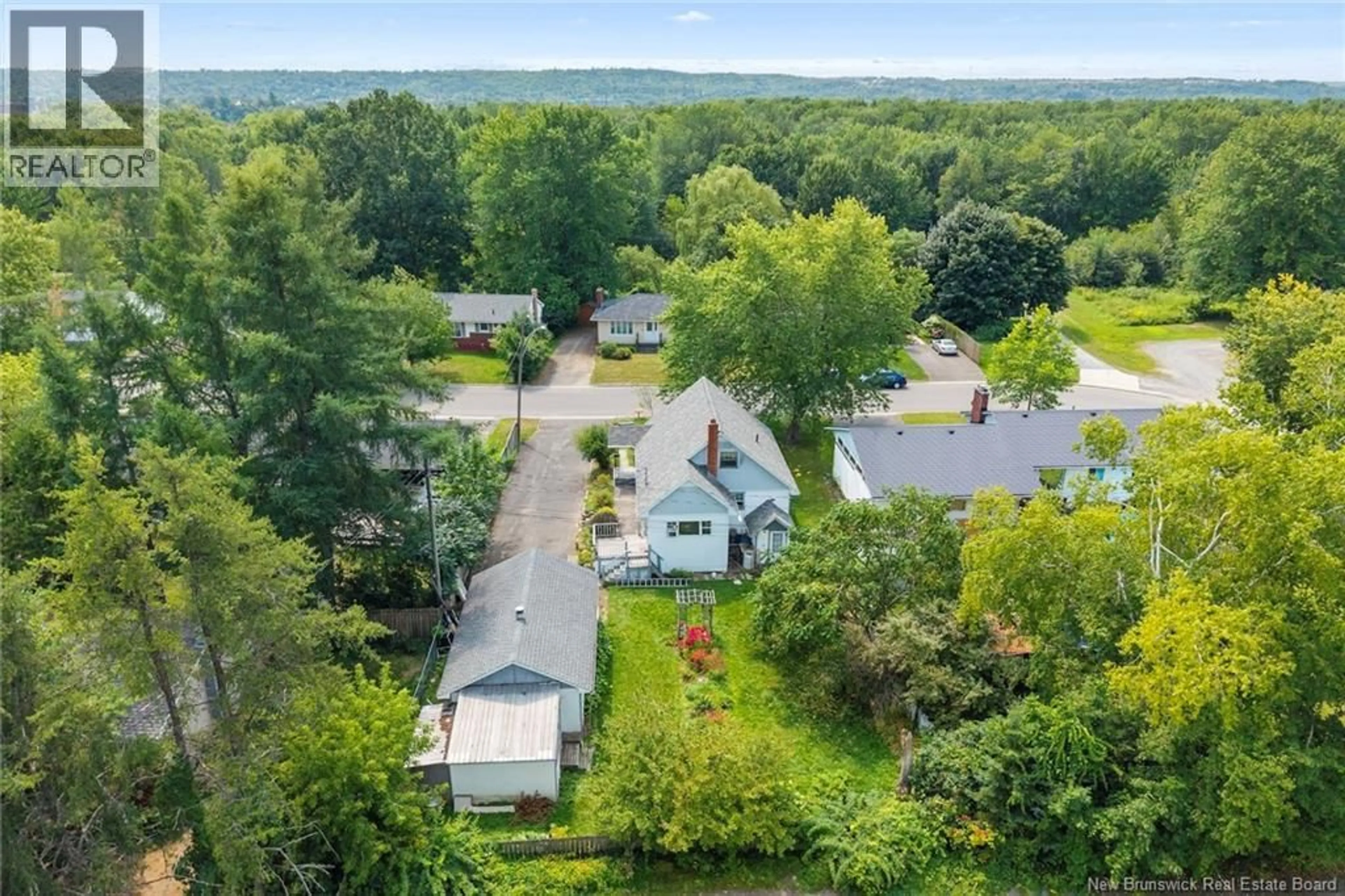 A pic from outside/outdoor area/front of a property/back of a property/a pic from drone, unknown for 41 HILLCOURT DRIVE, Fredericton New Brunswick E3A1S3