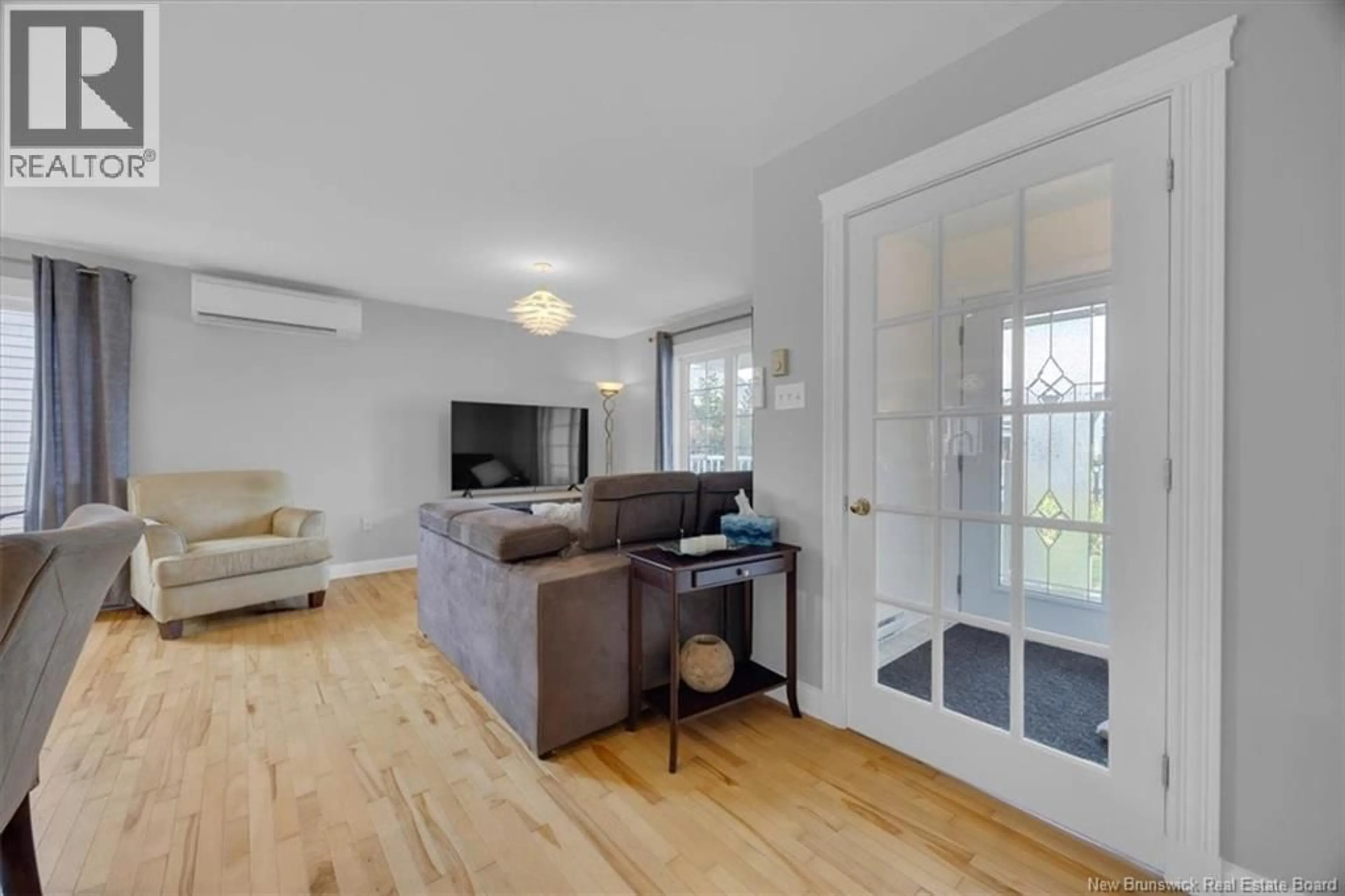 Living room with furniture, wood/laminate floor for 8 DEVONAYER COURT, Rothesay New Brunswick E2E1L4