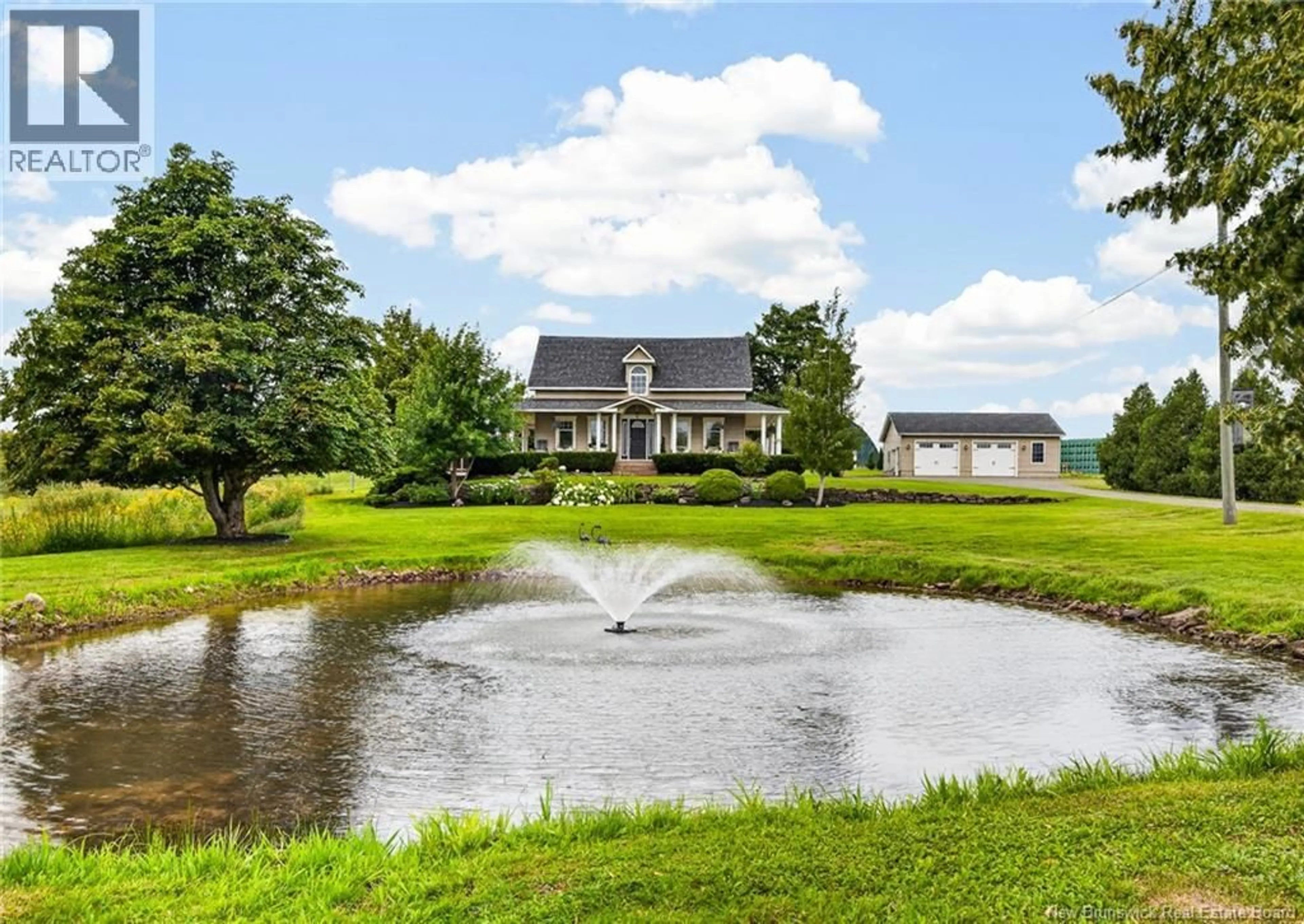 A pic from outside/outdoor area/front of a property/back of a property/a pic from drone, water/lake/river/ocean view for 2474 ROUTE 115, Irishtown New Brunswick E1H2L8