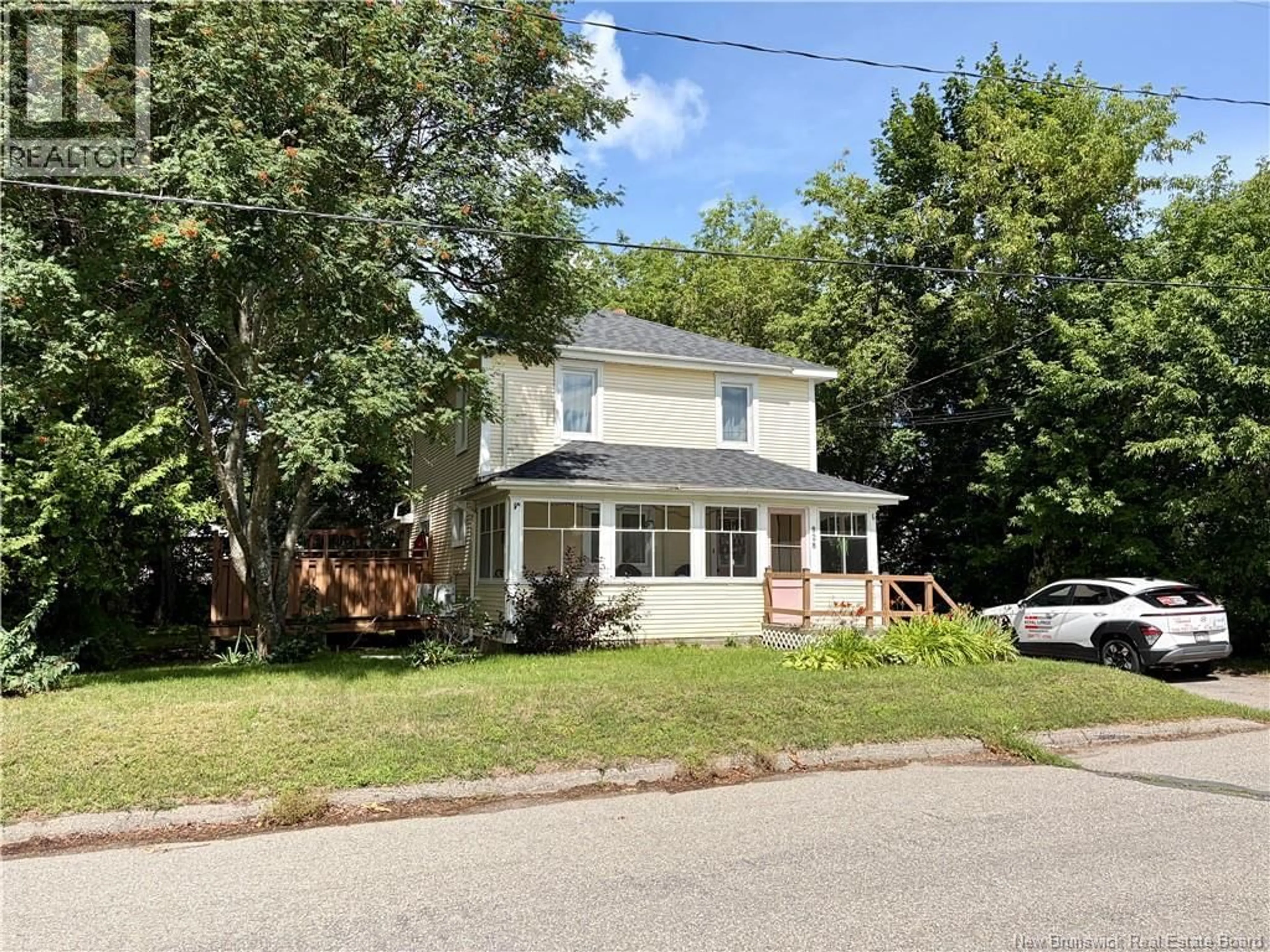 Home with vinyl exterior material, street for 828 LANDRY, Bathurst New Brunswick E2A2V3