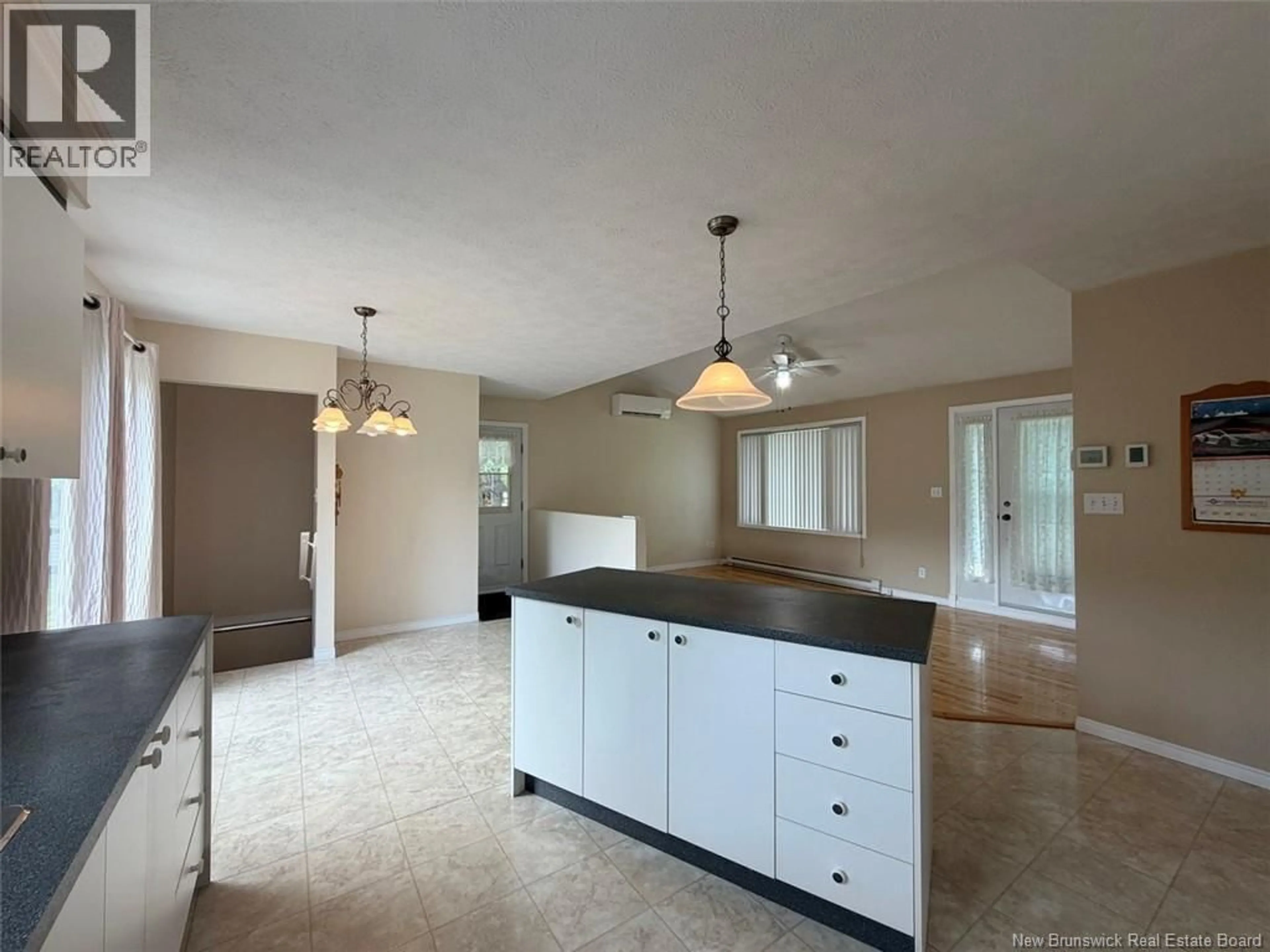 Open concept kitchen, ceramic/tile floor for 45 BEAULIEU STREET, Saint-Quentin New Brunswick E8A1B5