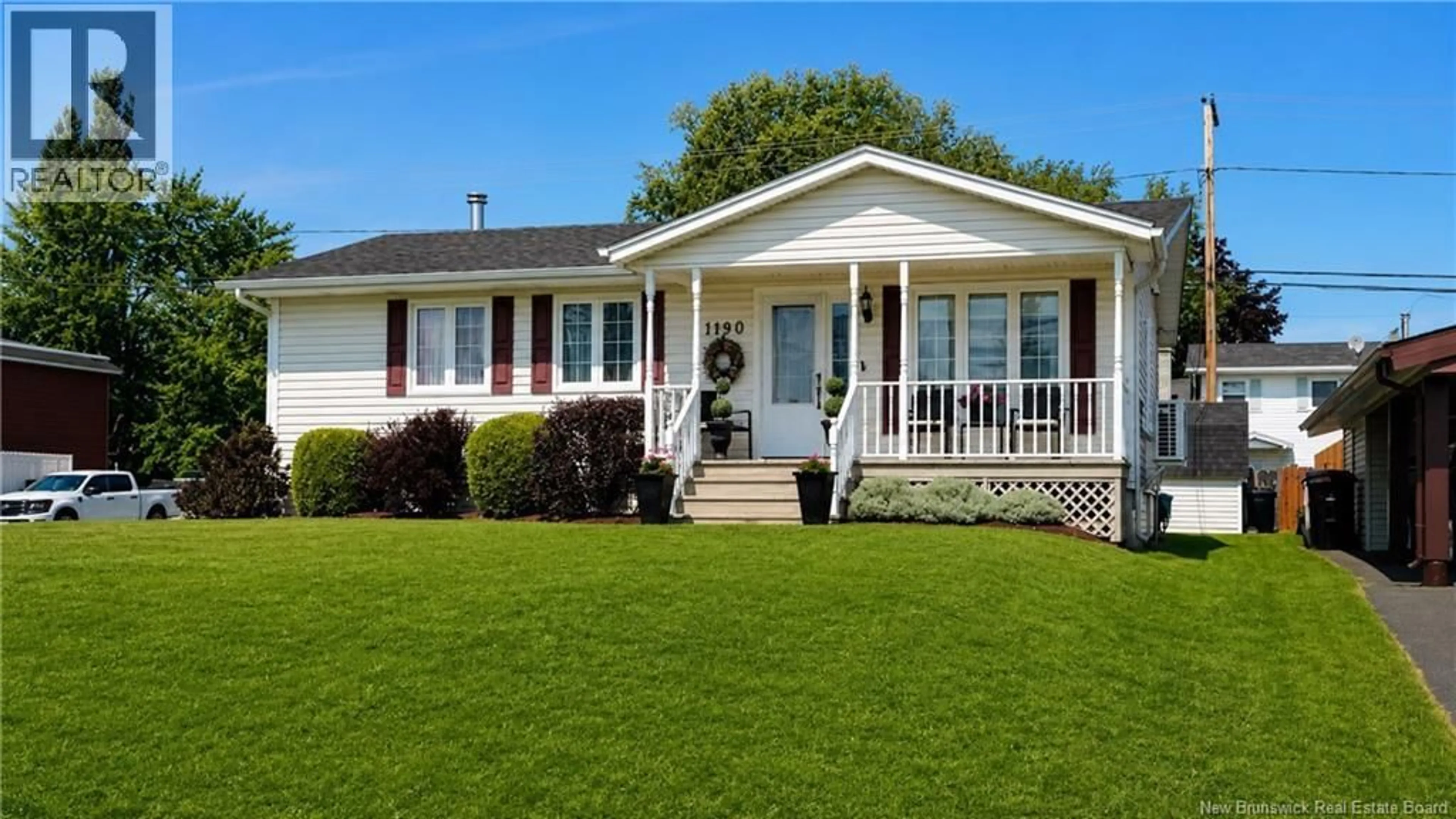 Home with vinyl exterior material, street for 1190 ROCKLAND DRIVE, Bathurst New Brunswick E2A3T9