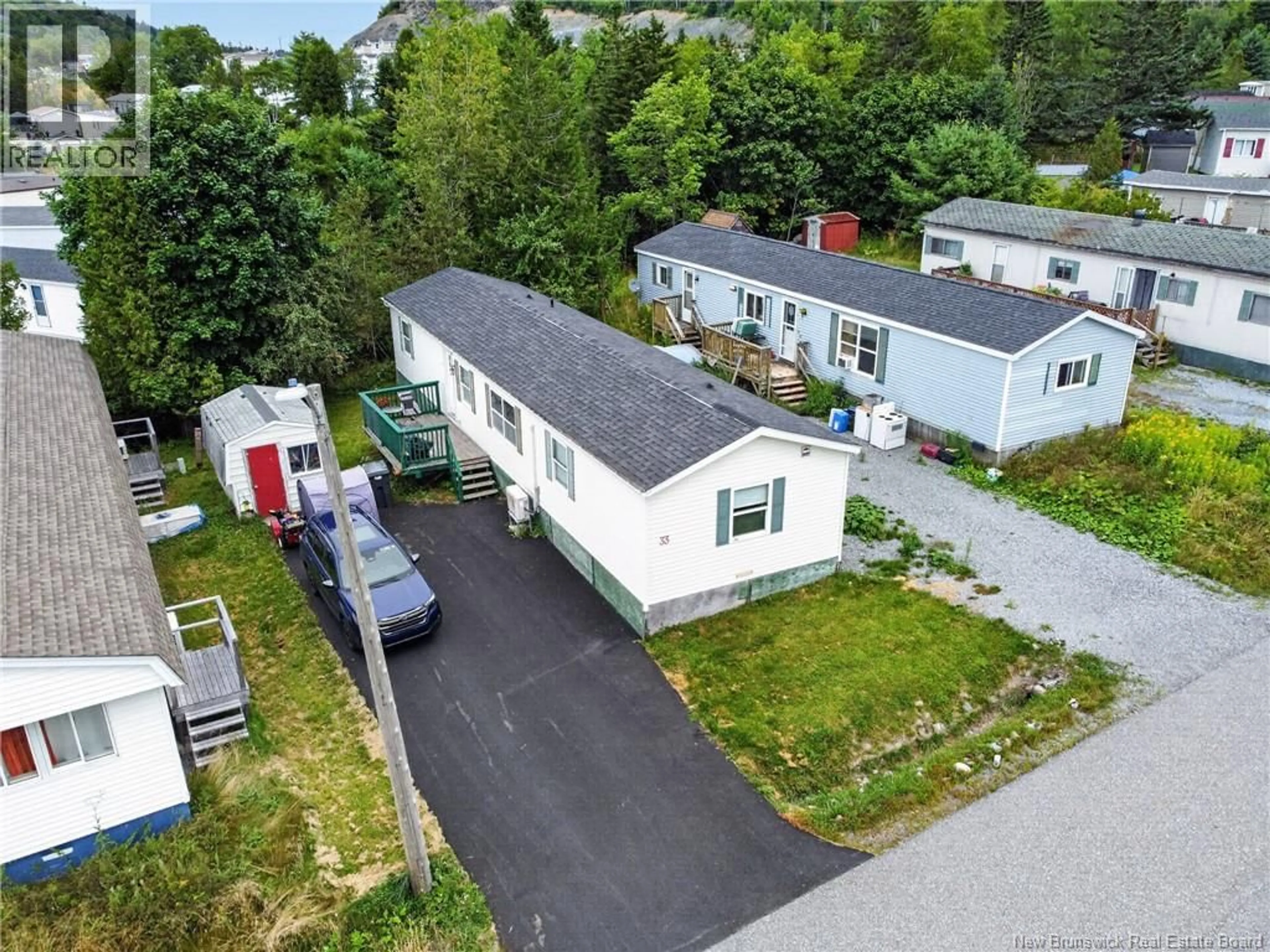 A pic from outside/outdoor area/front of a property/back of a property/a pic from drone, street for 33 GLENVIEW DRIVE, Saint John New Brunswick E2H2R5