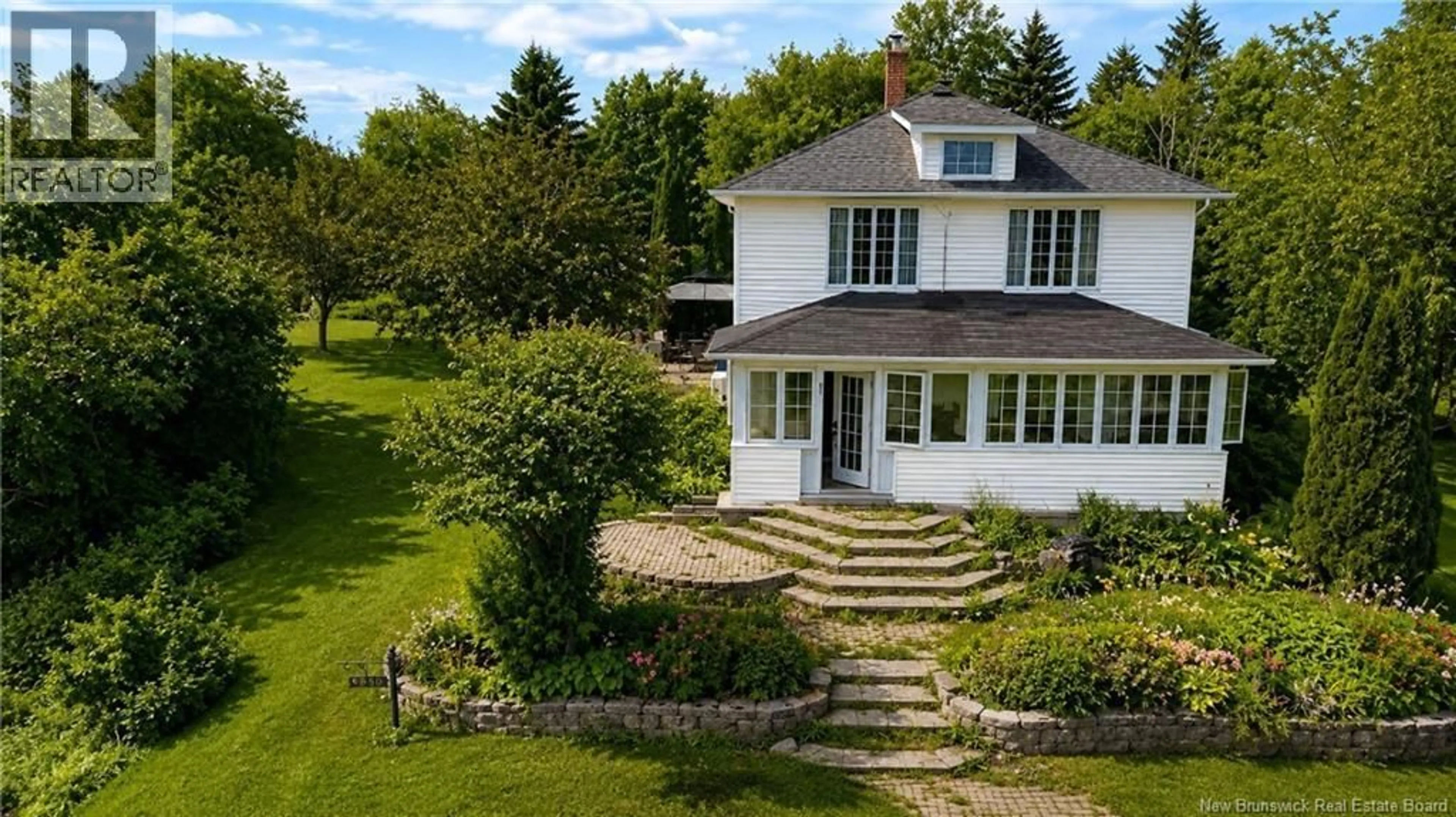 A pic from outside/outdoor area/front of a property/back of a property/a pic from drone, unknown for 650 WEST DRIVE, Bathurst New Brunswick E2A6L8