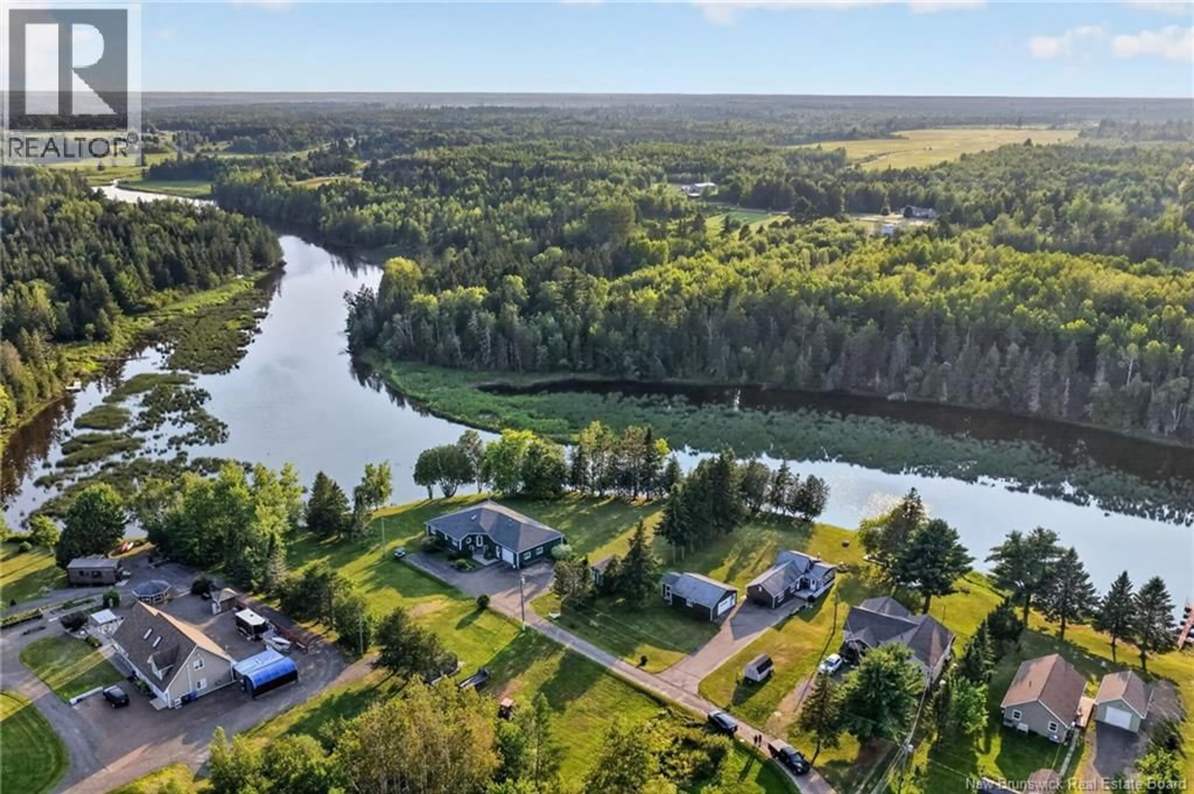 A pic from outside/outdoor area/front of a property/back of a property/a pic from drone, water/lake/river/ocean view for 44 JEAN BAPTISTE, Saint-Charles New Brunswick E4W4P4