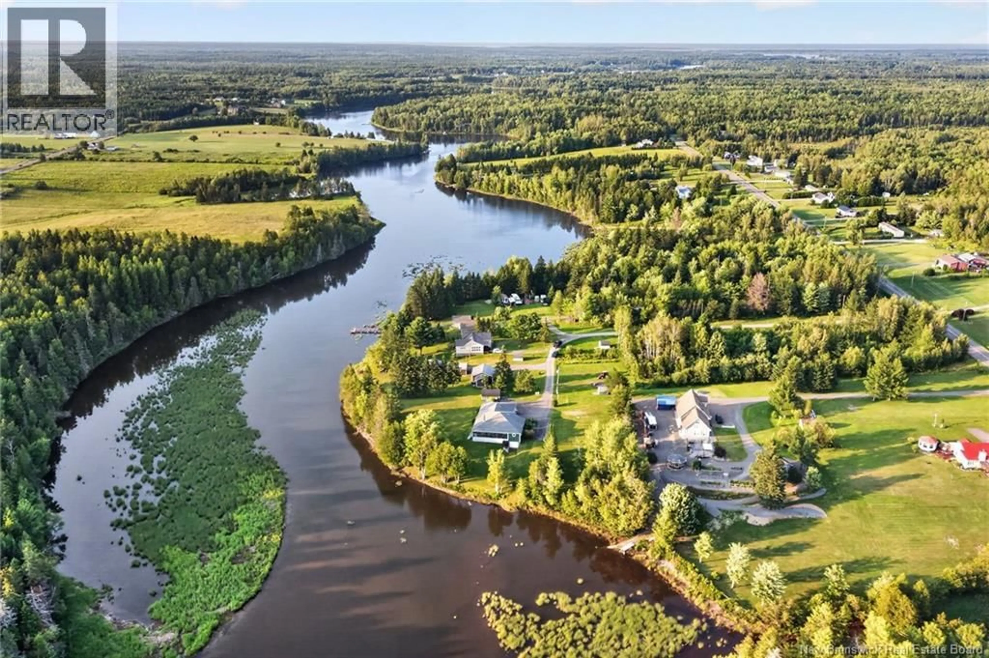 A pic from outside/outdoor area/front of a property/back of a property/a pic from drone, water/lake/river/ocean view for 44 JEAN BAPTISTE, Saint-Charles New Brunswick E4W4P4