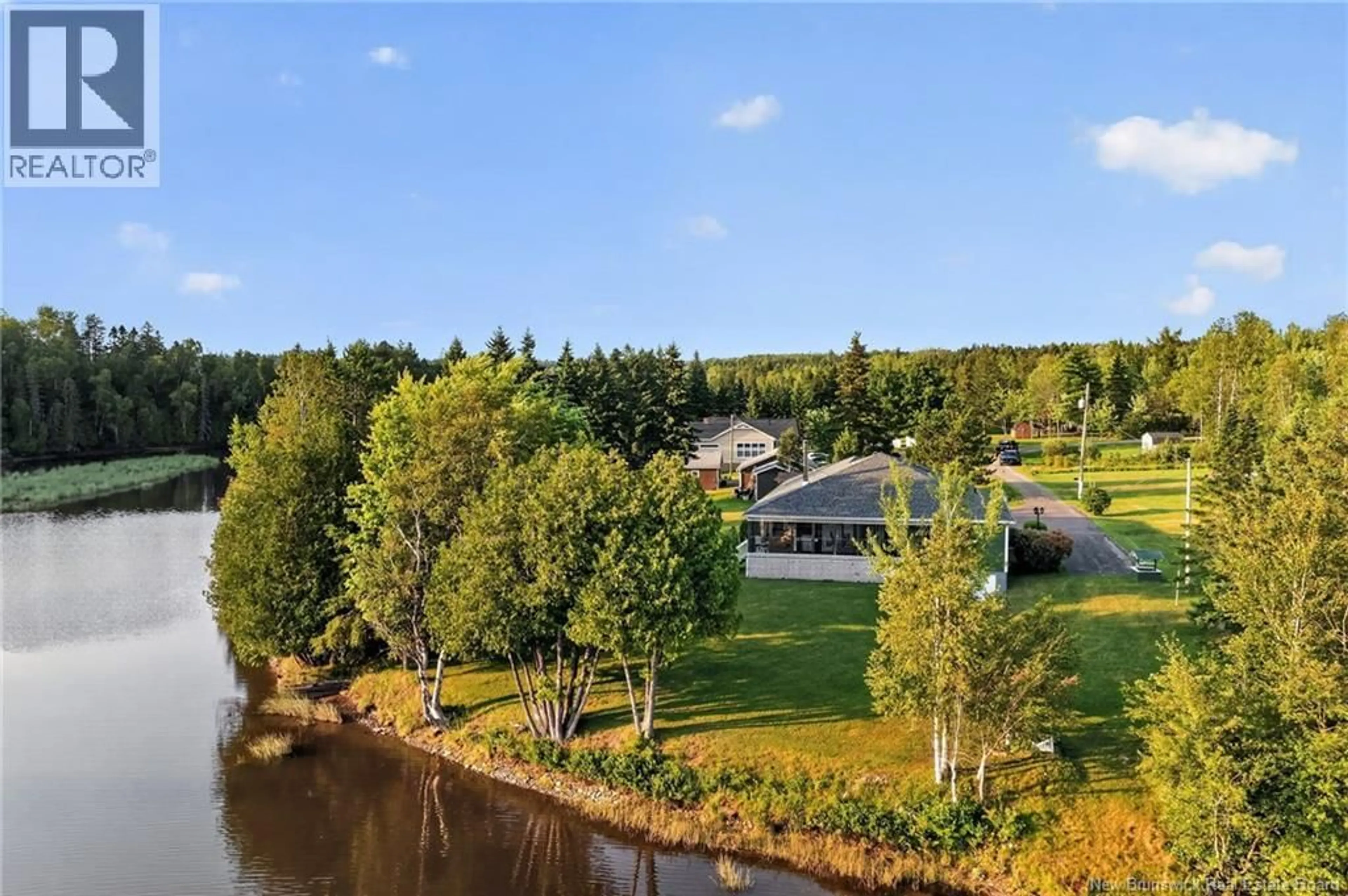 A pic from outside/outdoor area/front of a property/back of a property/a pic from drone, water/lake/river/ocean view for 44 JEAN BAPTISTE, Saint-Charles New Brunswick E4W4P4