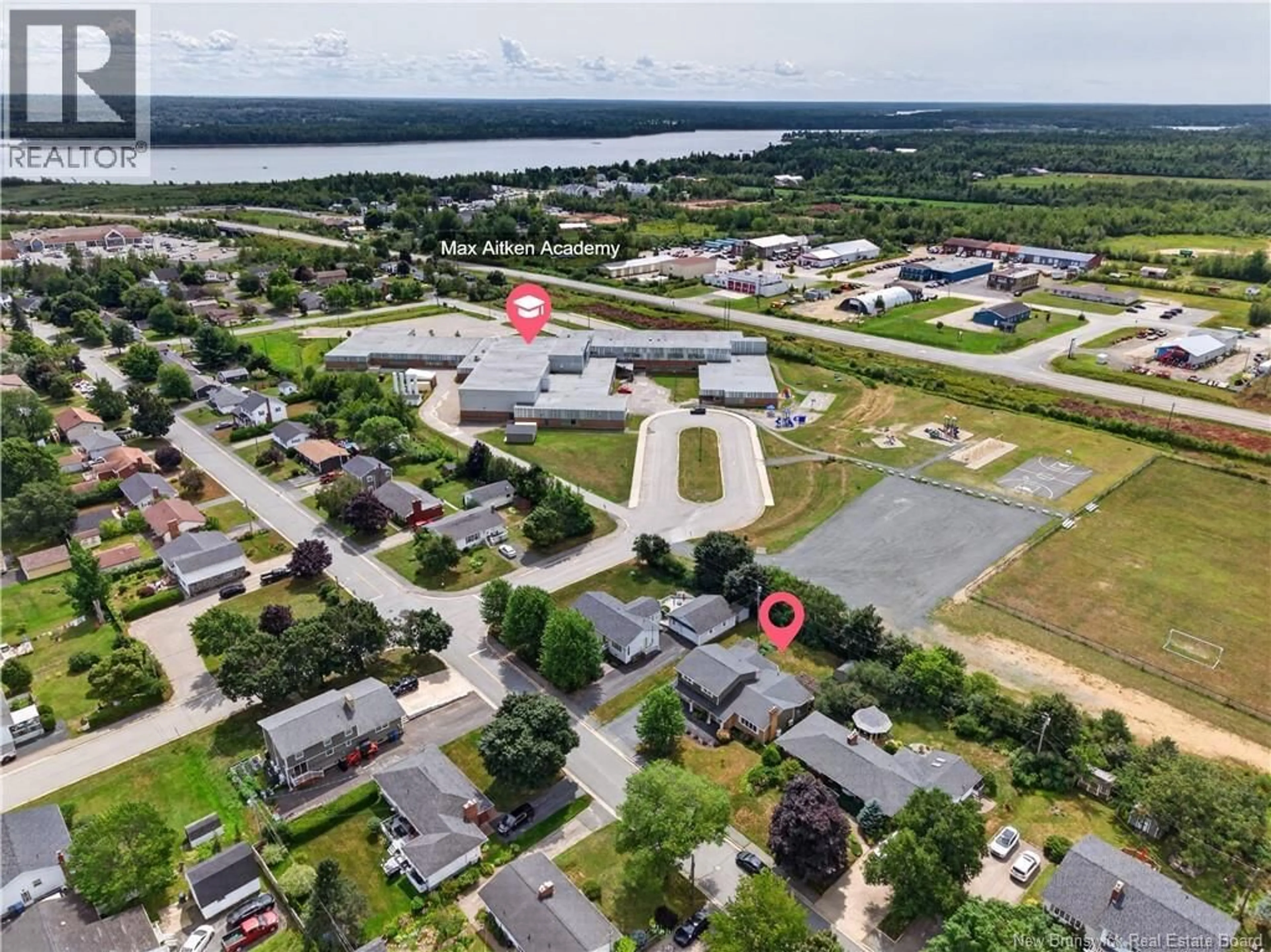 A pic from outside/outdoor area/front of a property/back of a property/a pic from drone, water/lake/river/ocean view for 293 MILLAR AVENUE, Miramichi New Brunswick E1V3B7