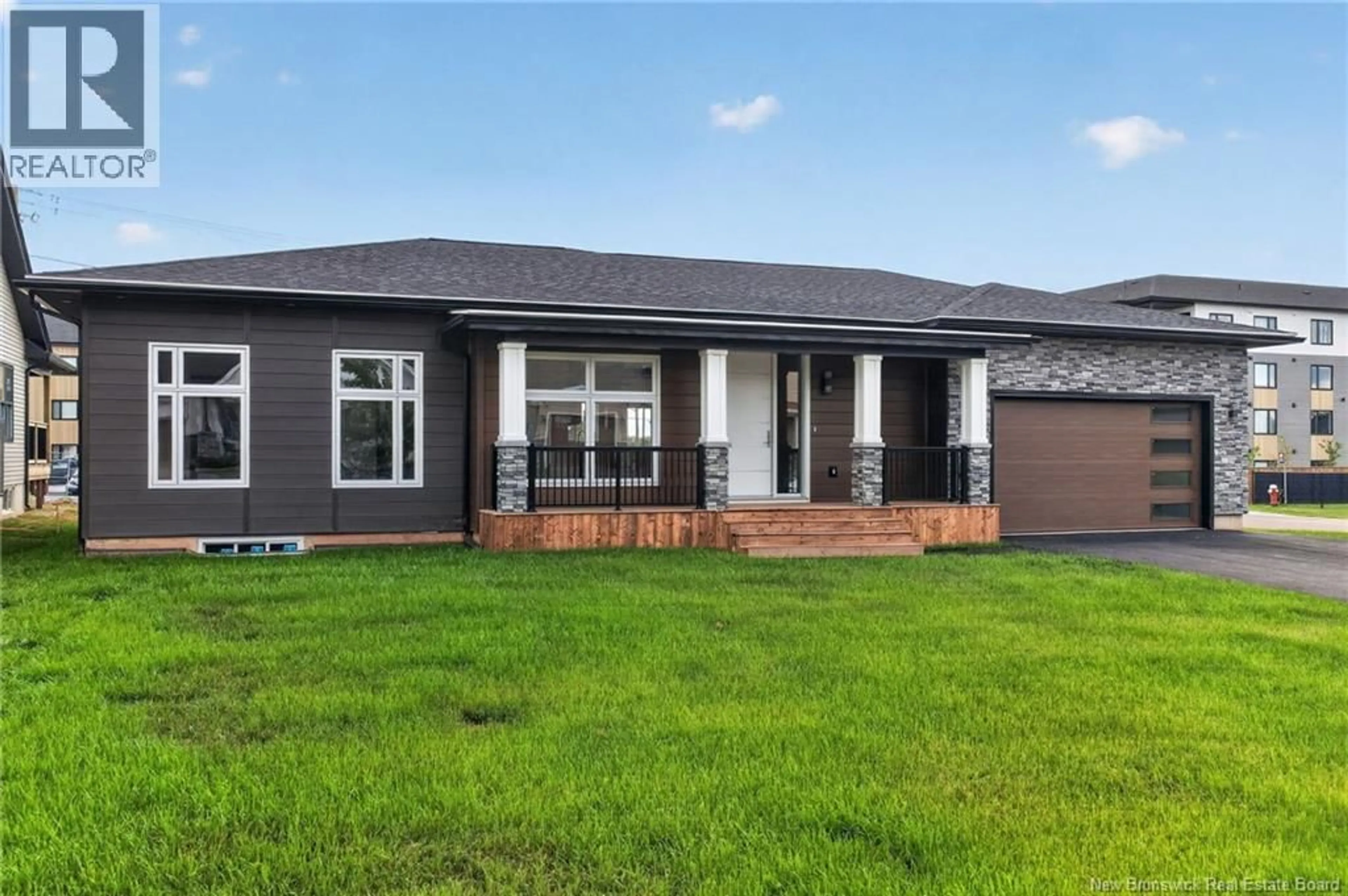 Home with brick exterior material, street for 66 BOUCHARD STREET, Dieppe New Brunswick E1A9T9
