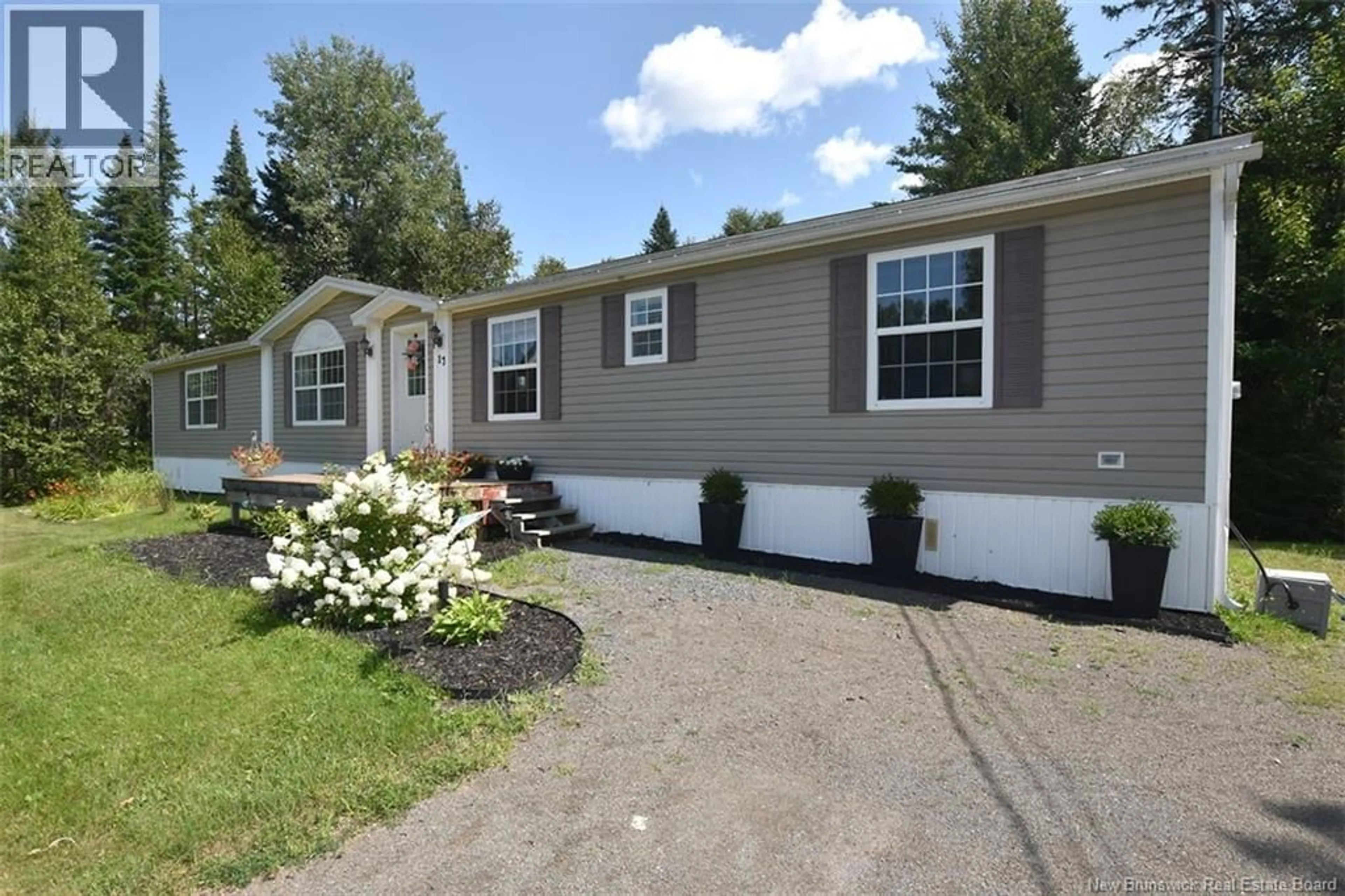Home with vinyl exterior material, street for 12 CEDAR STREET, Waasis New Brunswick E3B9C4