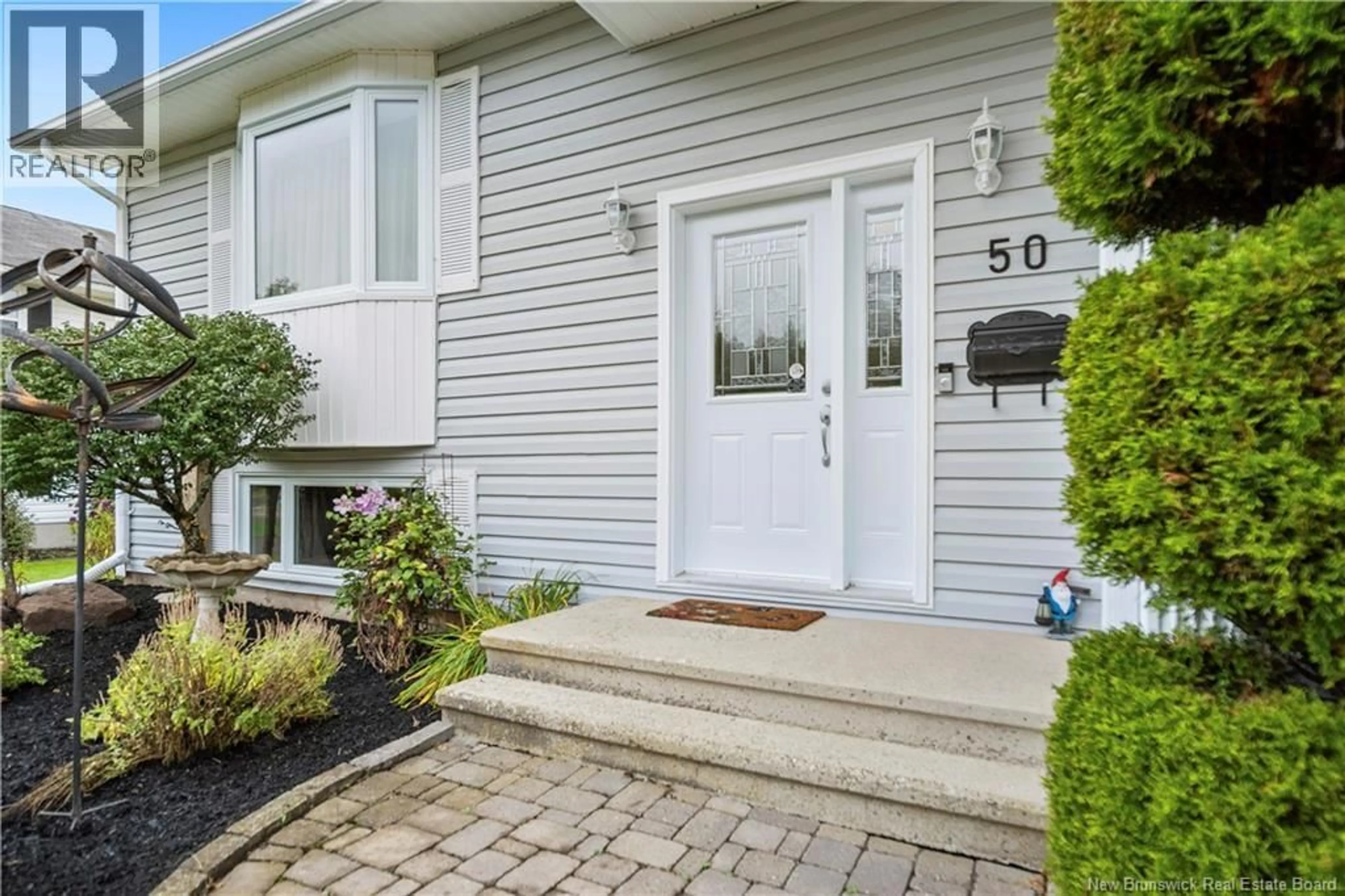Home with vinyl exterior material, street for 50 MCDOWELL AVENUE, Riverview New Brunswick E1B4J2